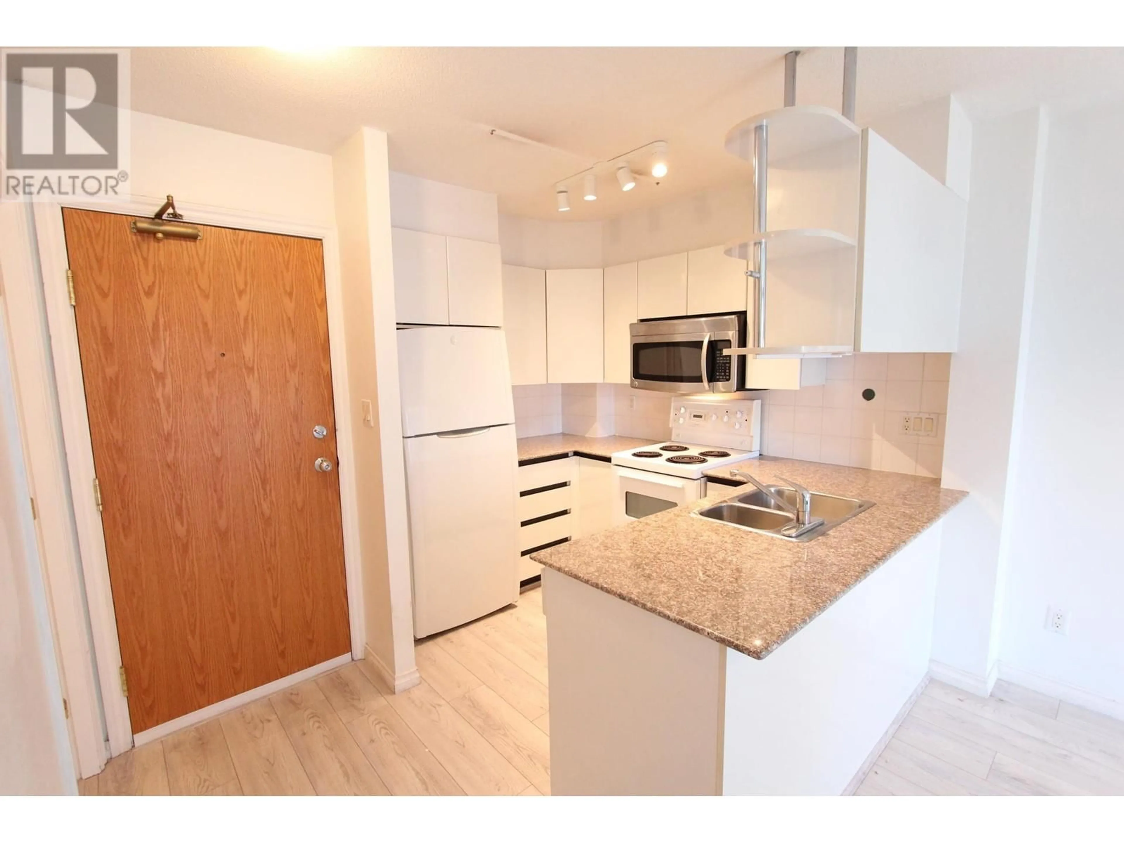 Kitchen, wood floors for 1603 1189 HOWE STREET, Vancouver British Columbia V6Z2X4