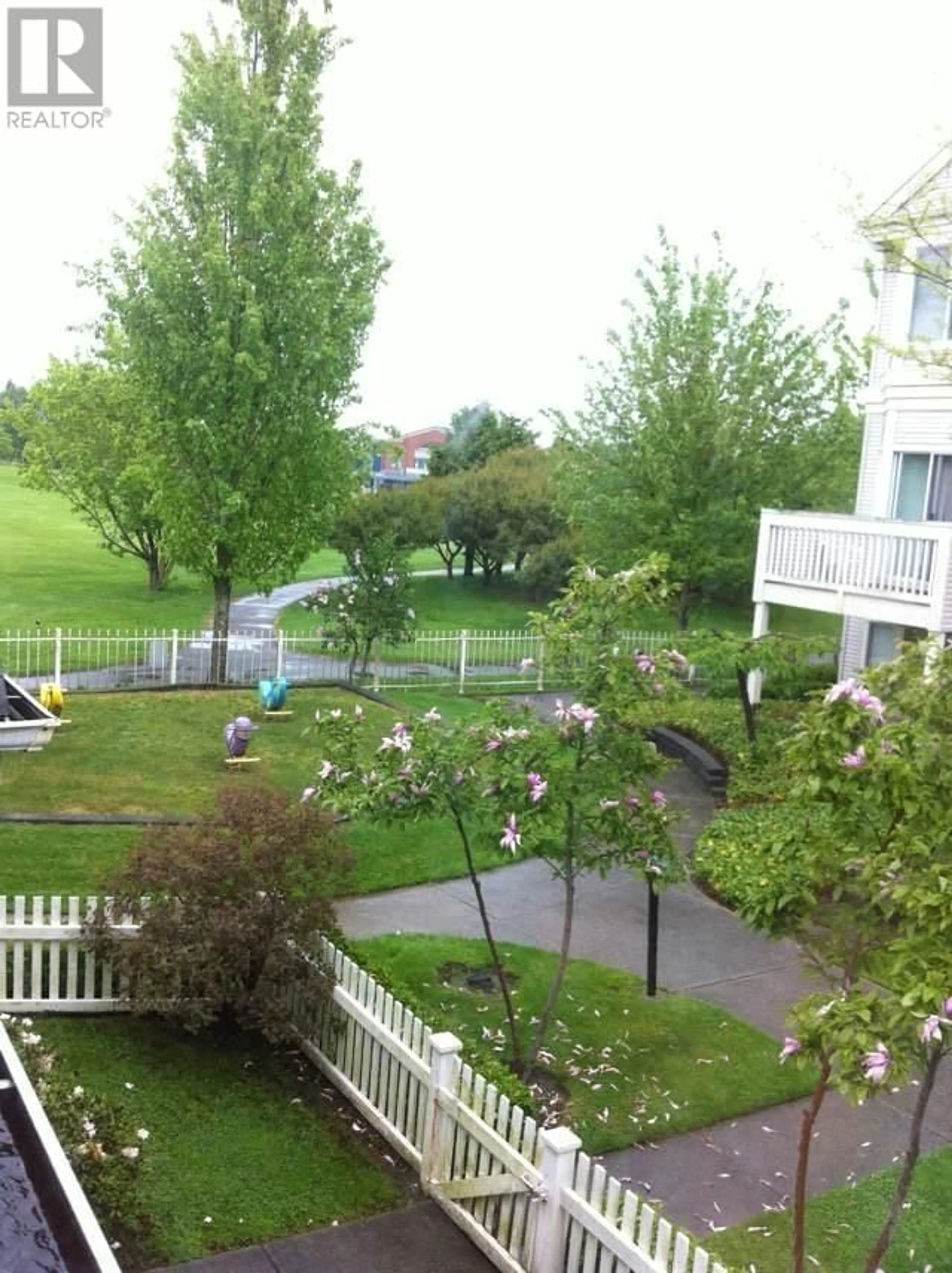 A pic from exterior of the house or condo, the fenced backyard for 23 12891 JACK BELL DRIVE, Richmond British Columbia V6V2T7