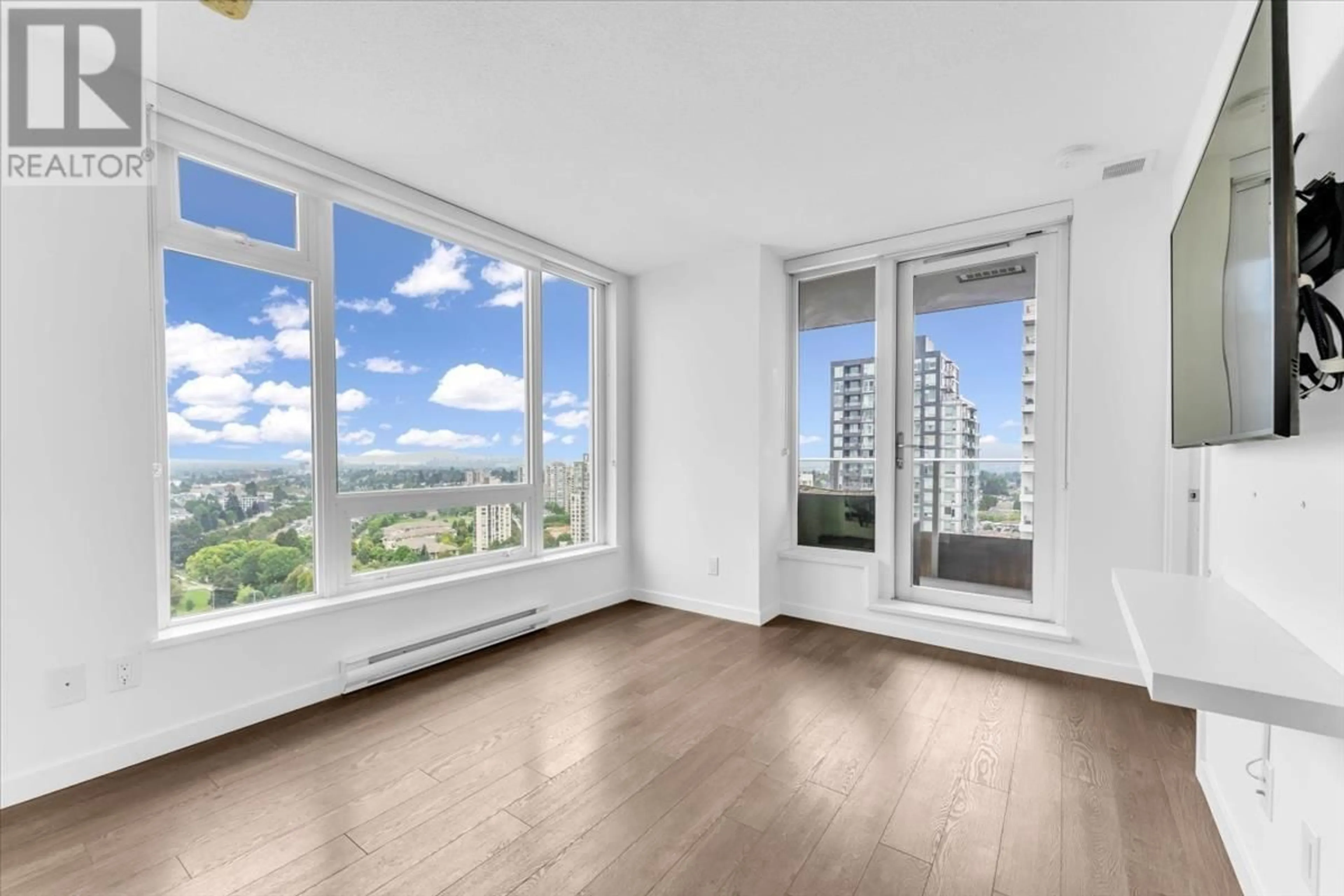 A pic of a room, wood floors for 2502 5665 BOUNDARY ROAD, Vancouver British Columbia V5R0E4