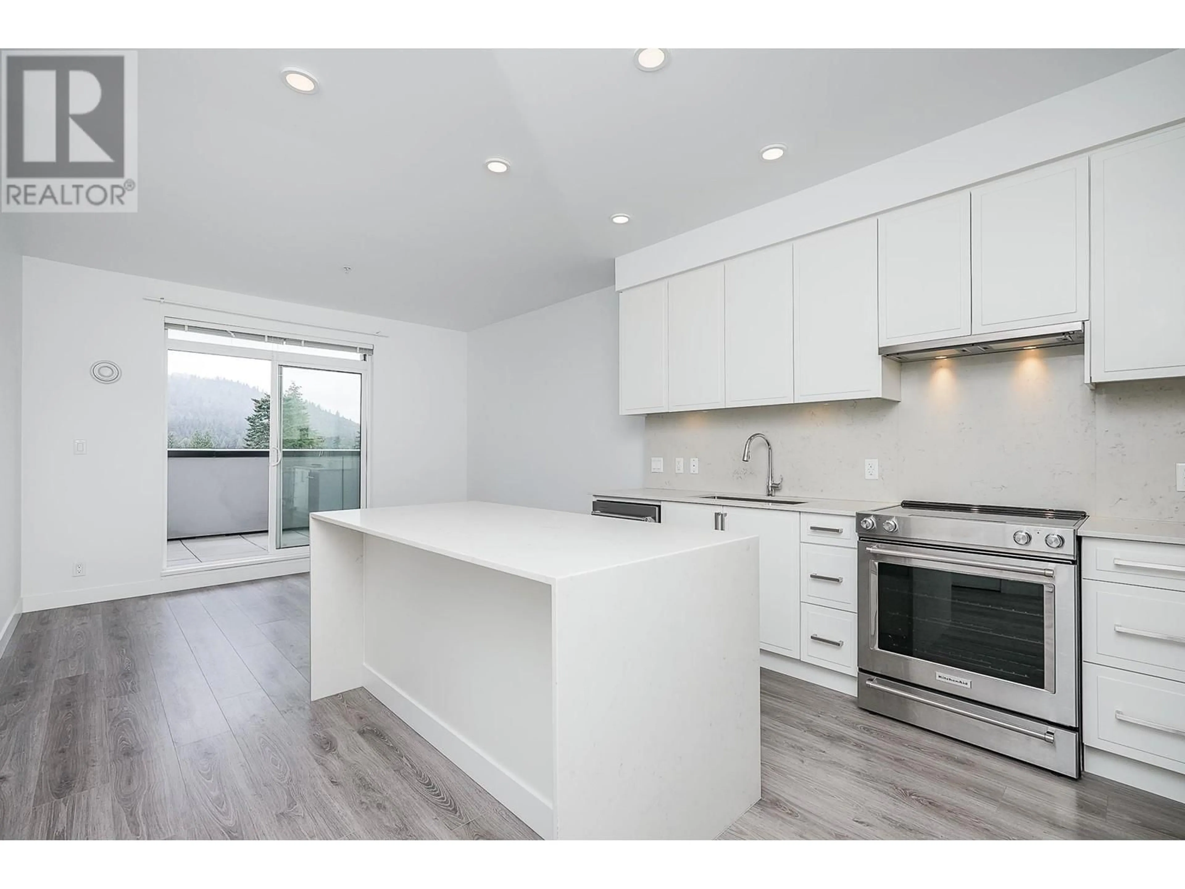 Open concept kitchen for 507 700 CLARKE ROAD, Coquitlam British Columbia V3J0K5