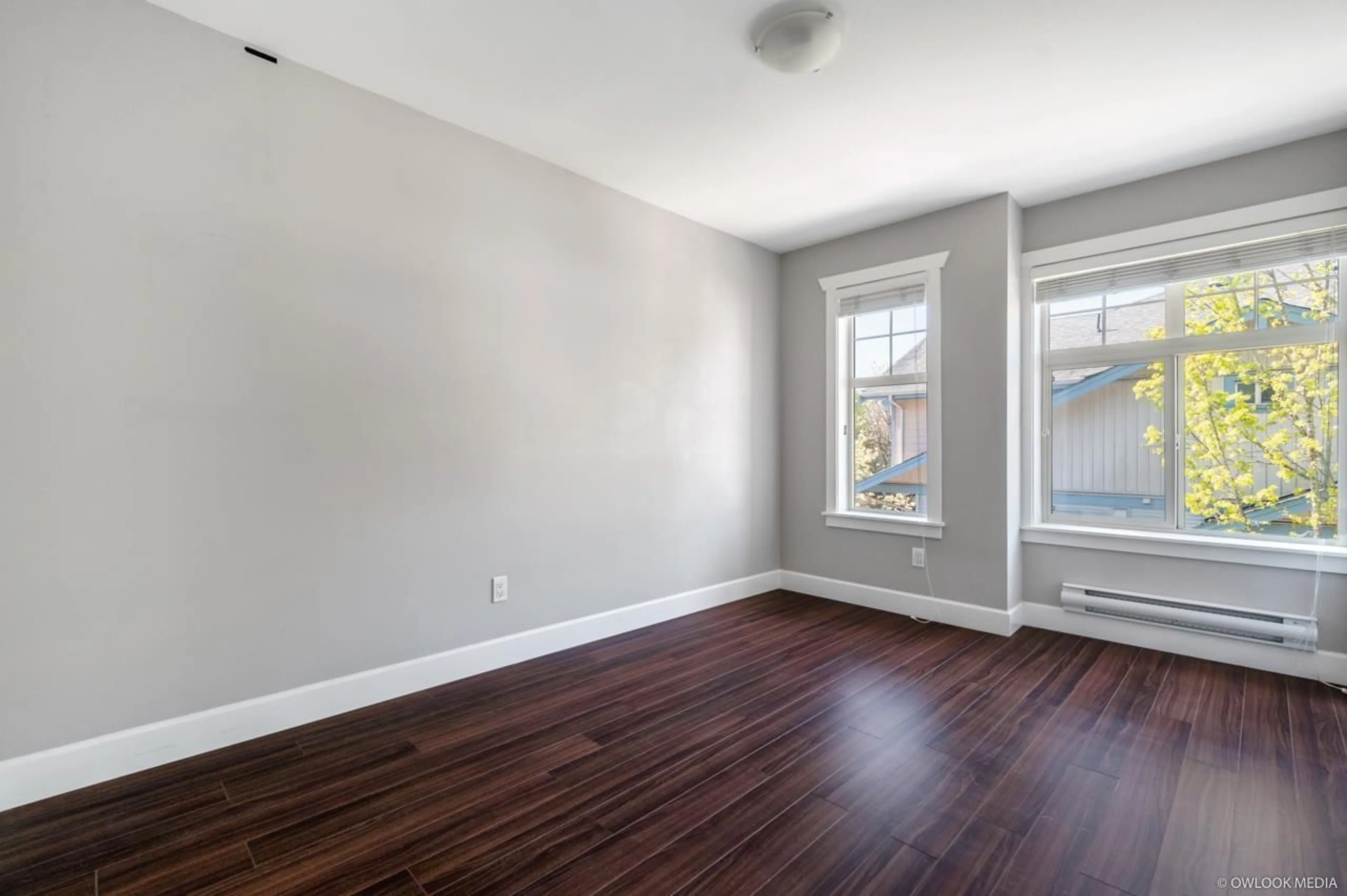 A pic of a room, wood floors for 6 12036 66 AVENUE, Surrey British Columbia V3W3M2