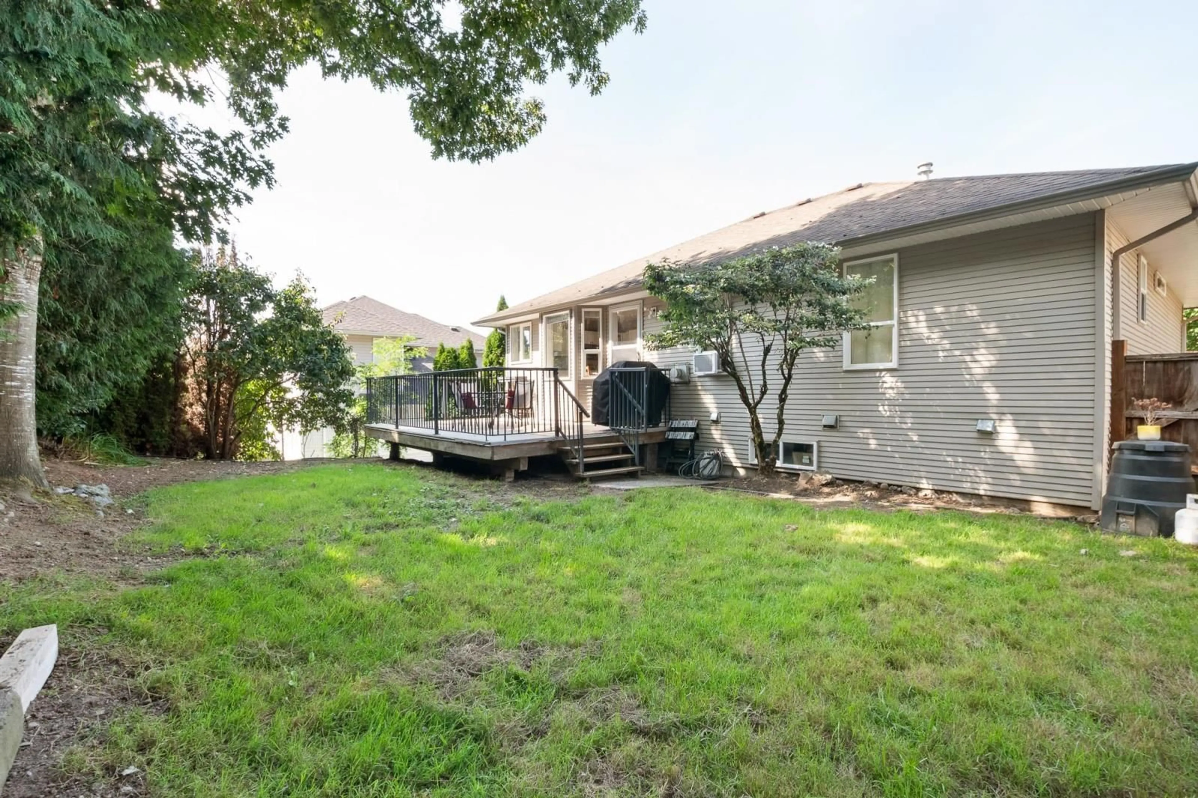 Frontside or backside of a home, the fenced backyard for 46690 SYLVAN DRIVE, Chilliwack British Columbia V2R3W5