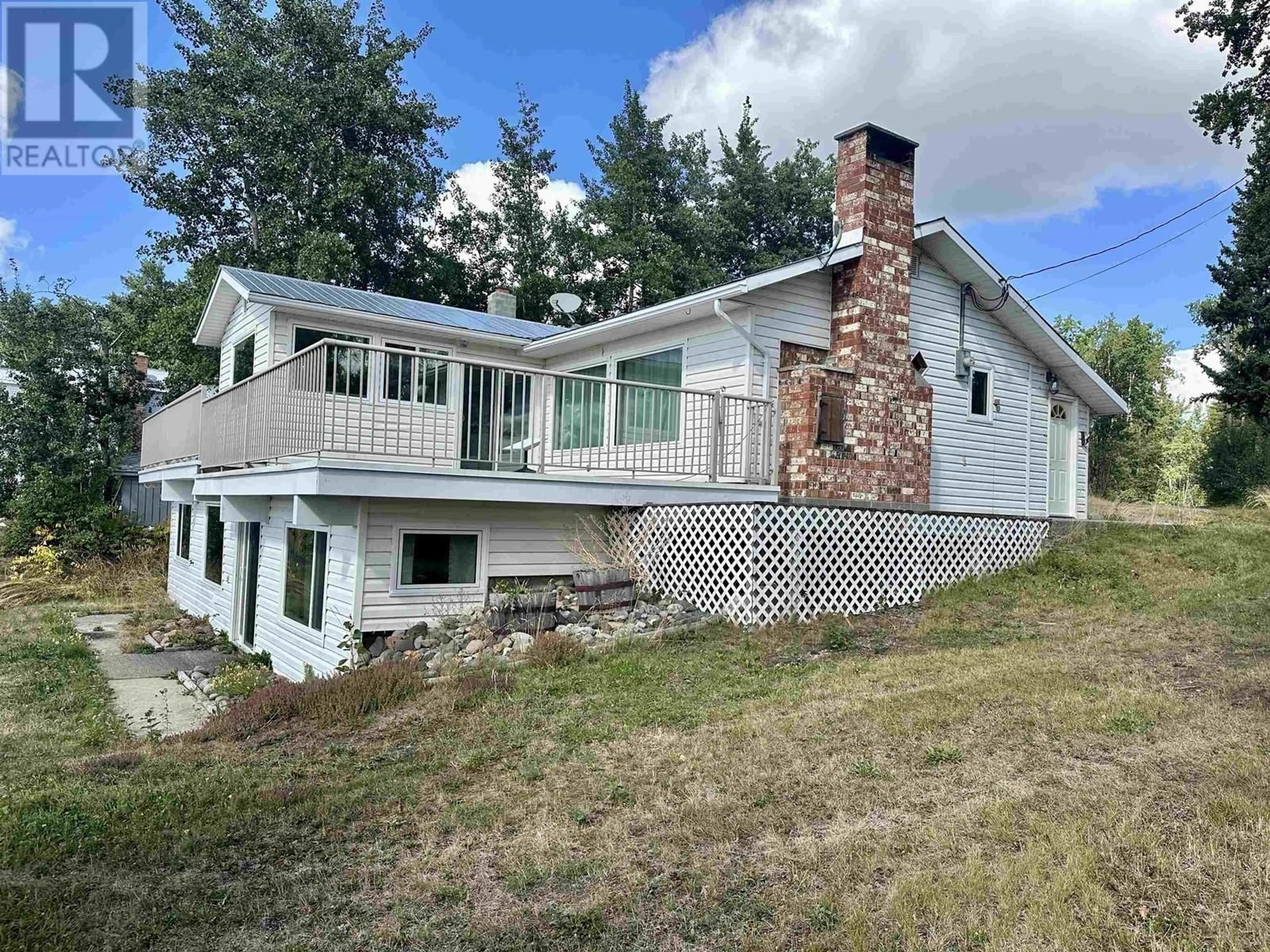 A pic from outside/outdoor area/front of a property/back of a property/a pic from drone, unknown for 54665 JARDINE ROAD, Cluculz Lake British Columbia V0J3A3