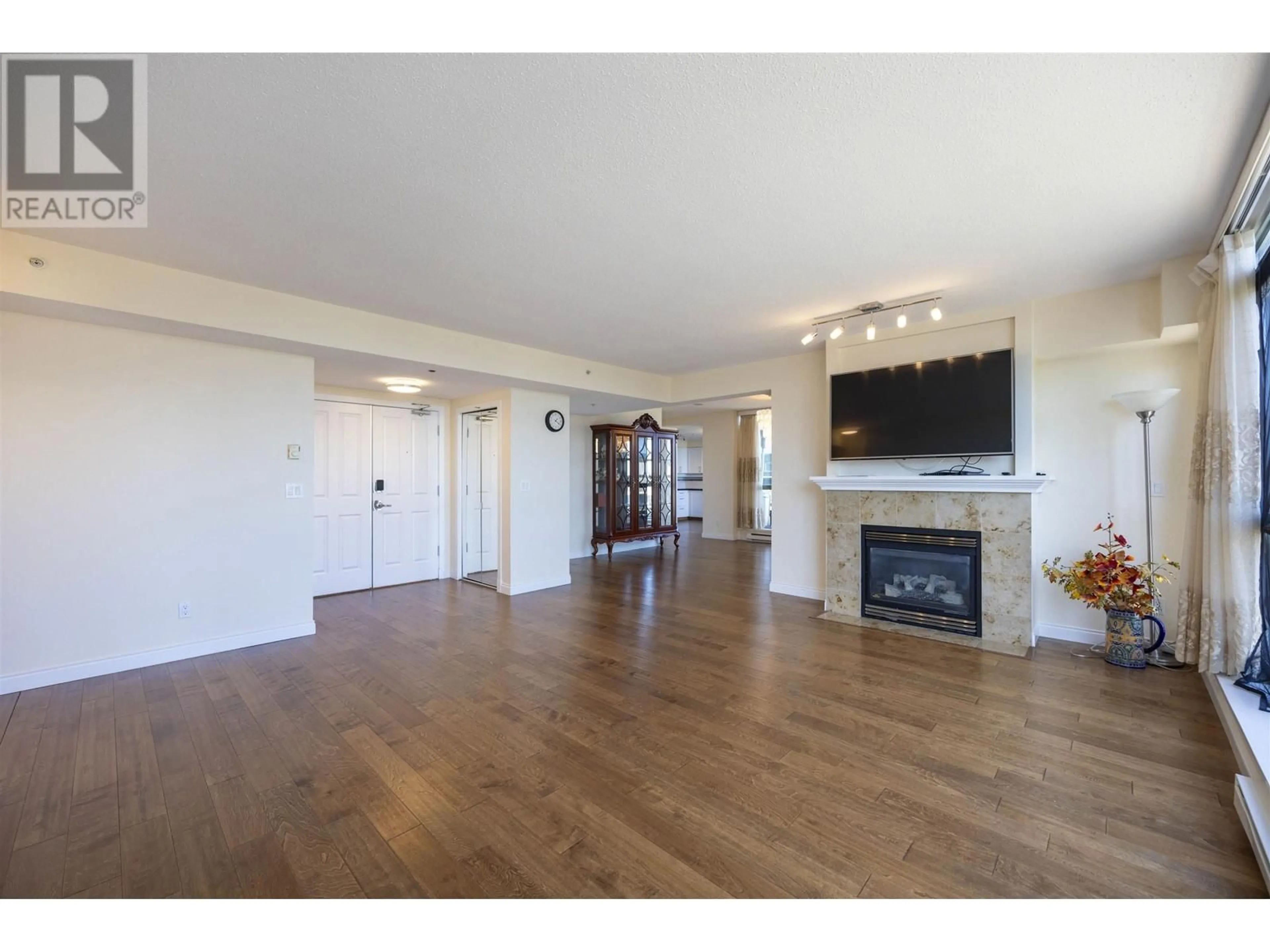 A pic of a room, wood floors for 1702 4788 HAZEL STREET, Burnaby British Columbia V5H4V9