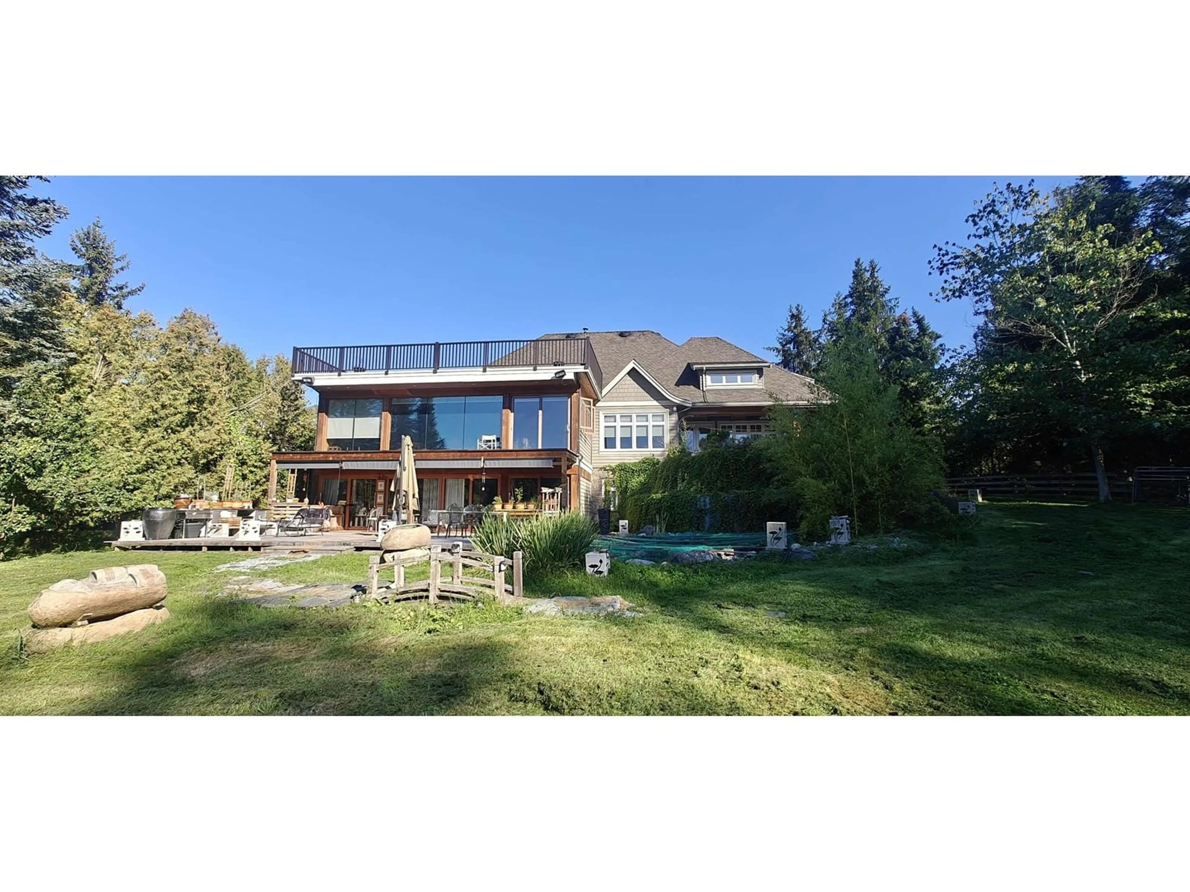 A pic from outside/outdoor area/front of a property/back of a property/a pic from drone, mountain view for 23455 8, Langley British Columbia V2Z2X9