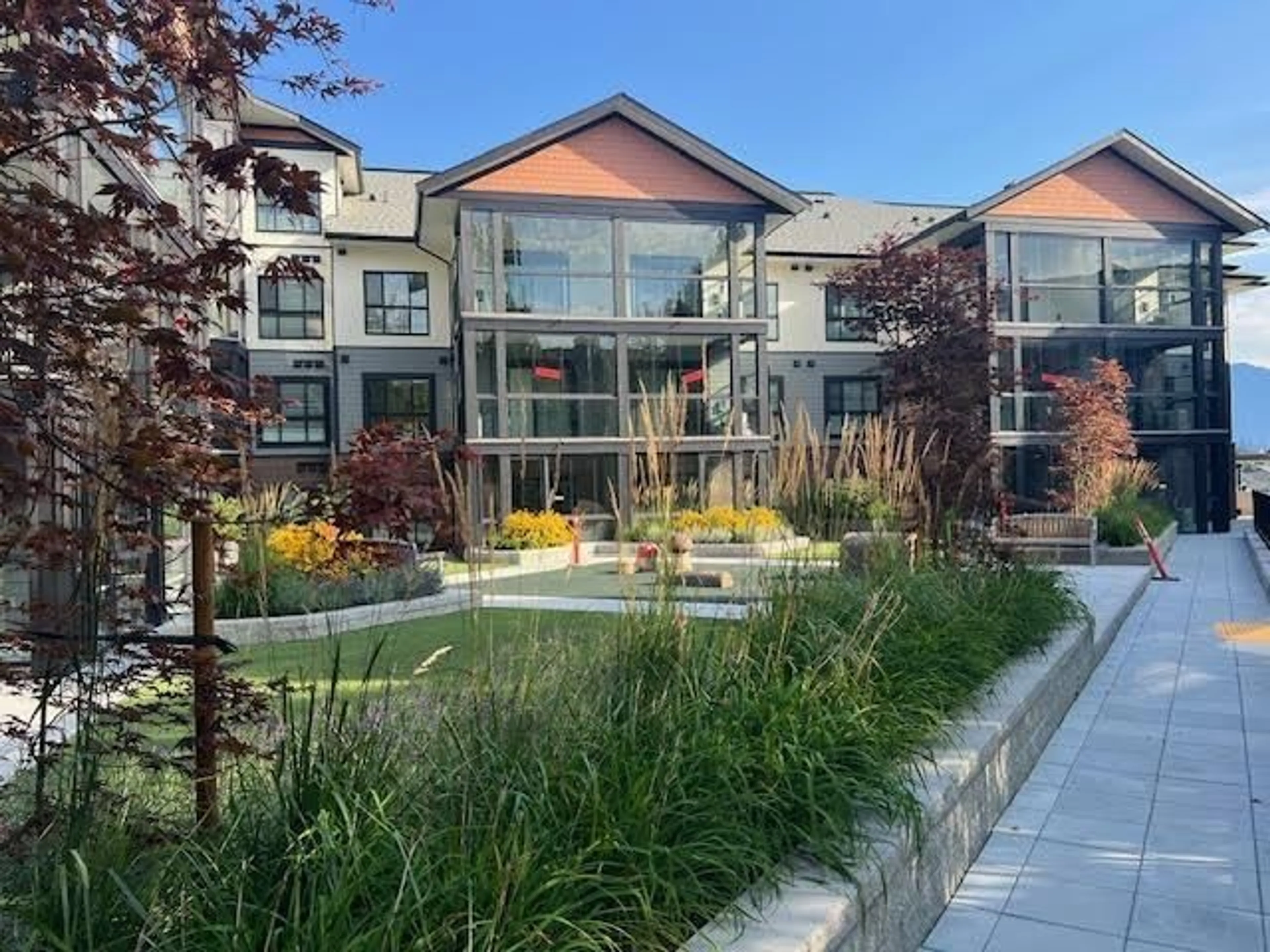 A pic from exterior of the house or condo, the front or back of building for 221 8497 YOUNG ROAD|Chilliwack Proper So, Chilliwack British Columbia V2P0M6