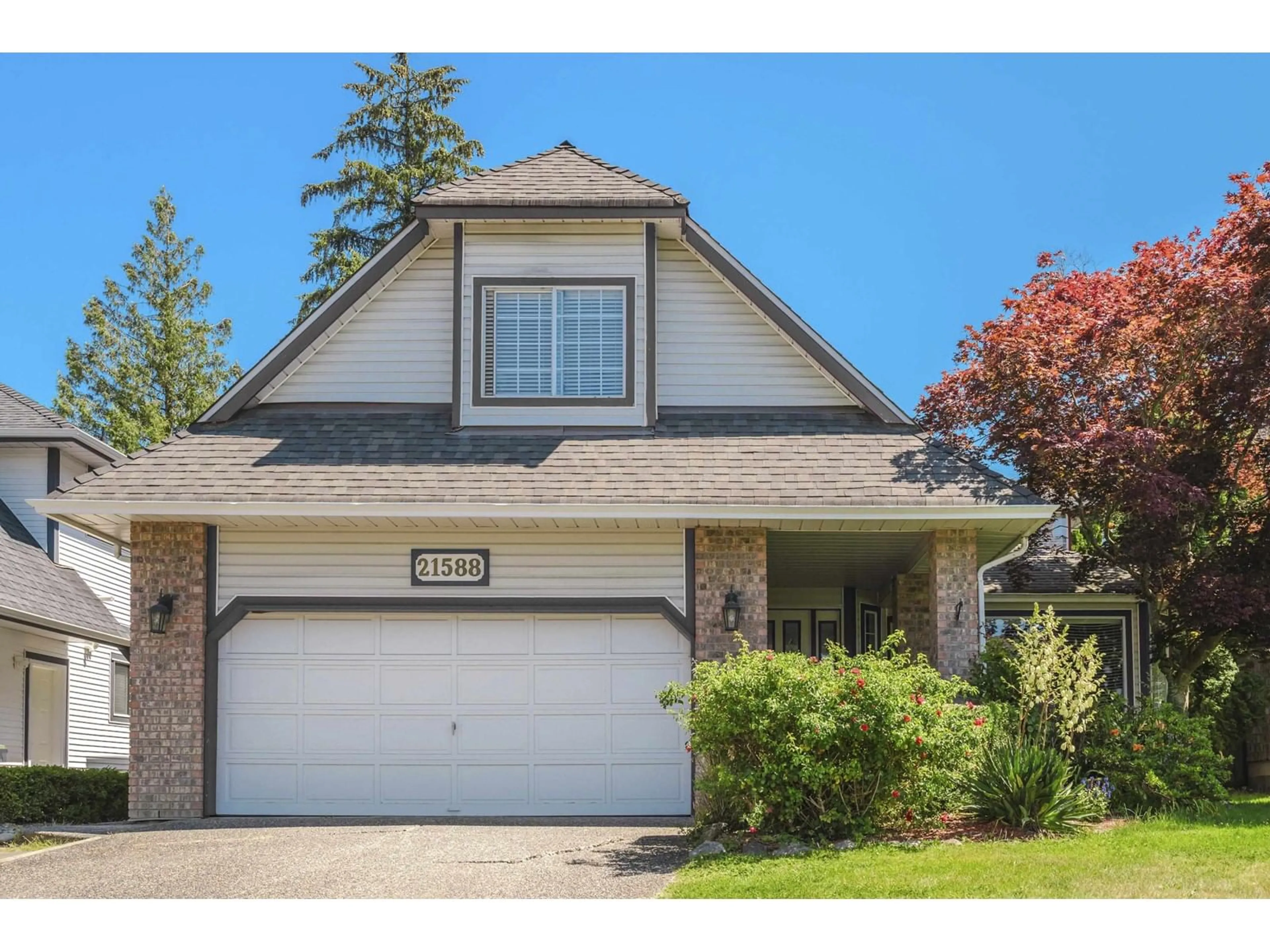 Frontside or backside of a home, cottage for 21588 87A AVENUE, Langley British Columbia V1M2E4