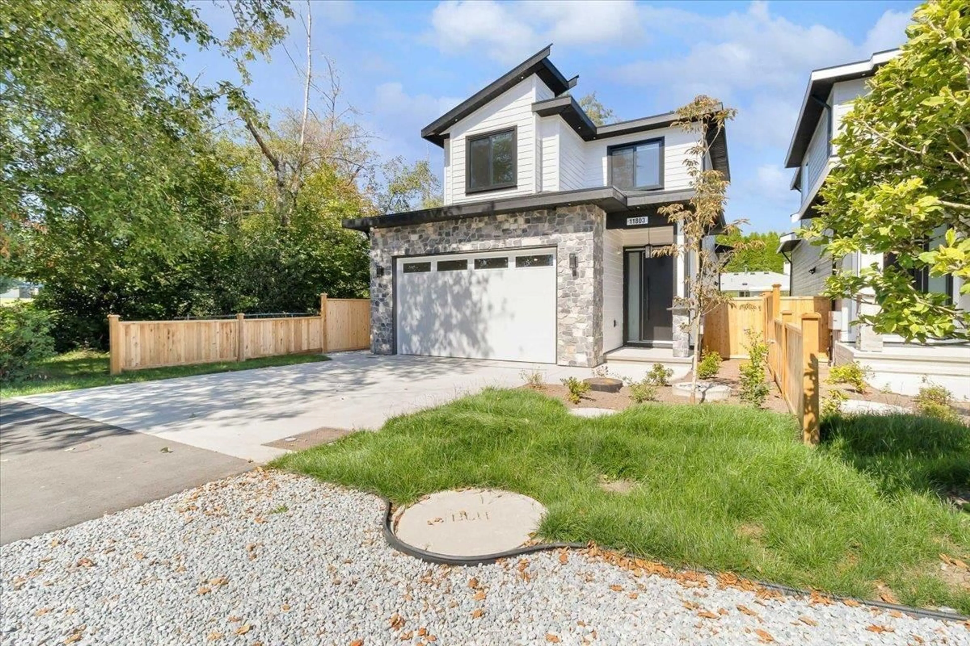 Frontside or backside of a home, the fenced backyard for 11803 86A AVENUE, Delta British Columbia V4C2Z2