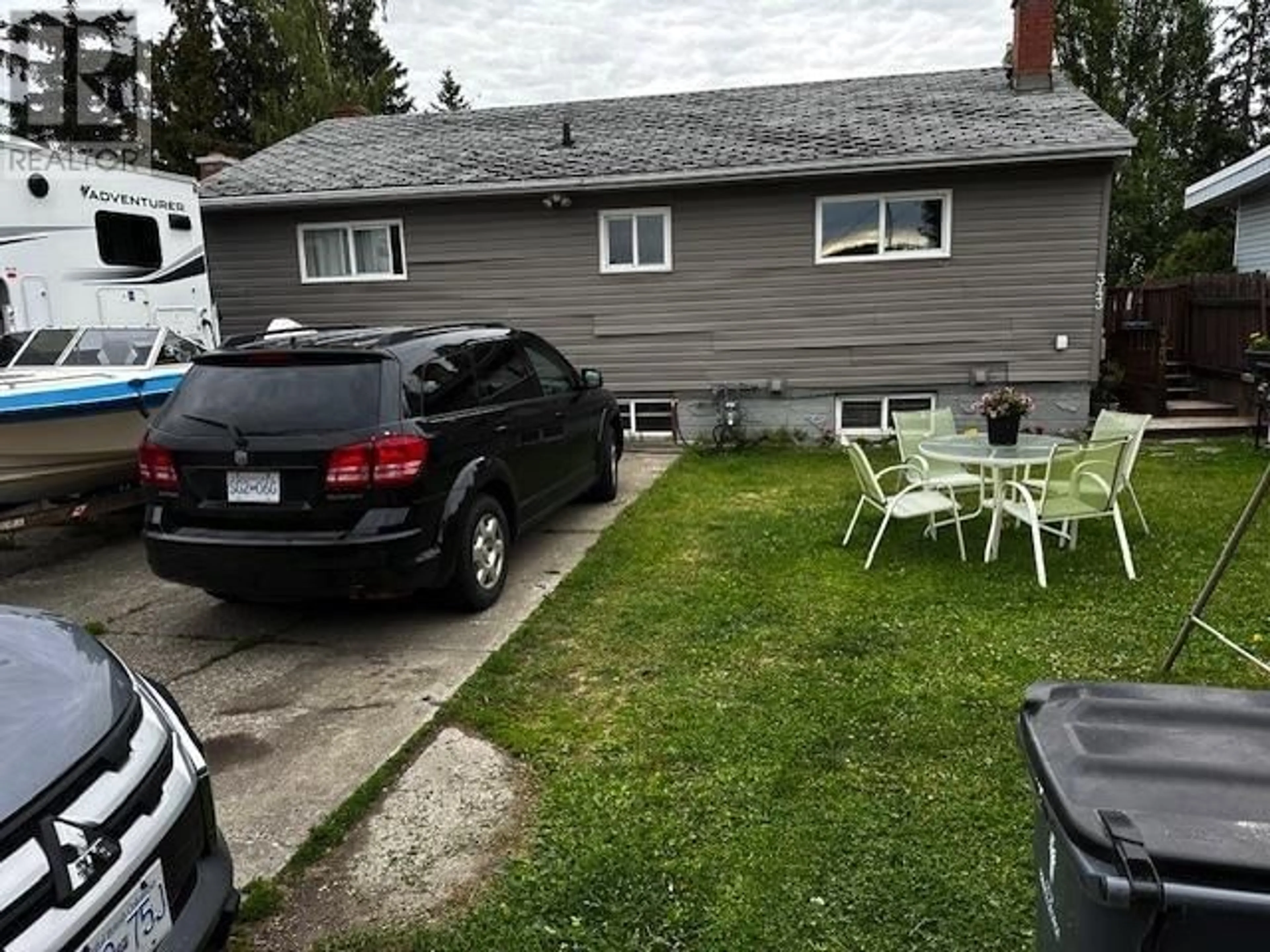 A pic from outside/outdoor area/front of a property/back of a property/a pic from drone, street for 343 LYON STREET, Prince George British Columbia V2N4Y4