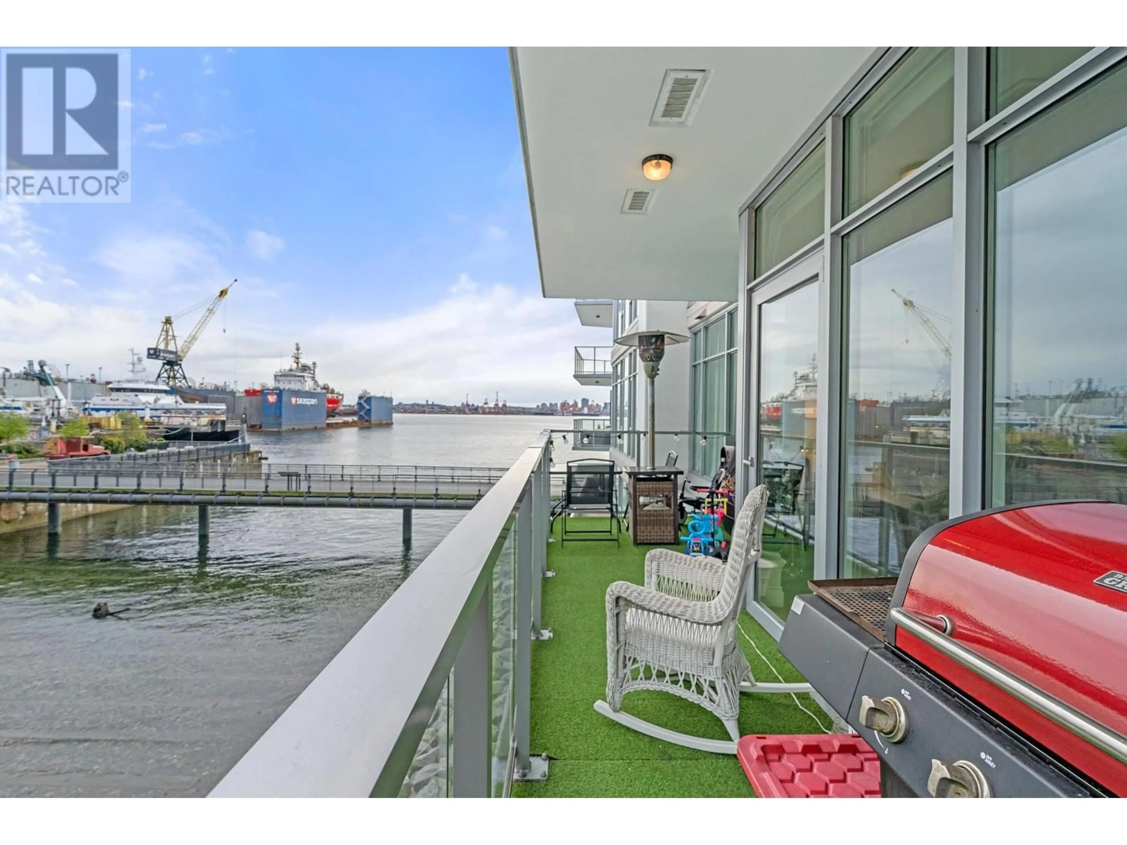 Patio, water/lake/river/ocean view for 204 - 175 VICTORY SHIP WAY, North Vancouver British Columbia V7L0G1