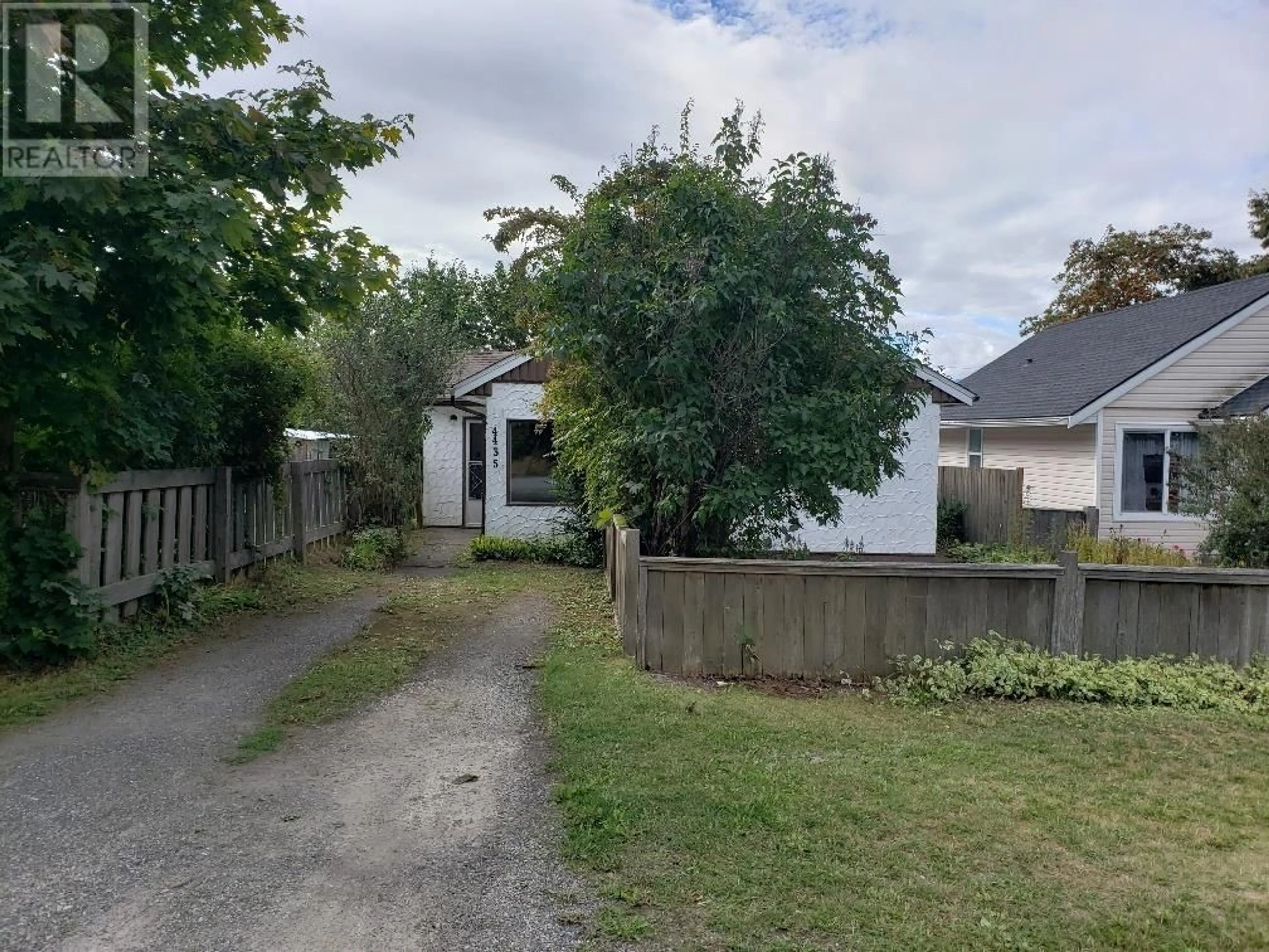 Frontside or backside of a home, the fenced backyard for 4435 LAZELLE AVENUE, Terrace British Columbia V8G1R9