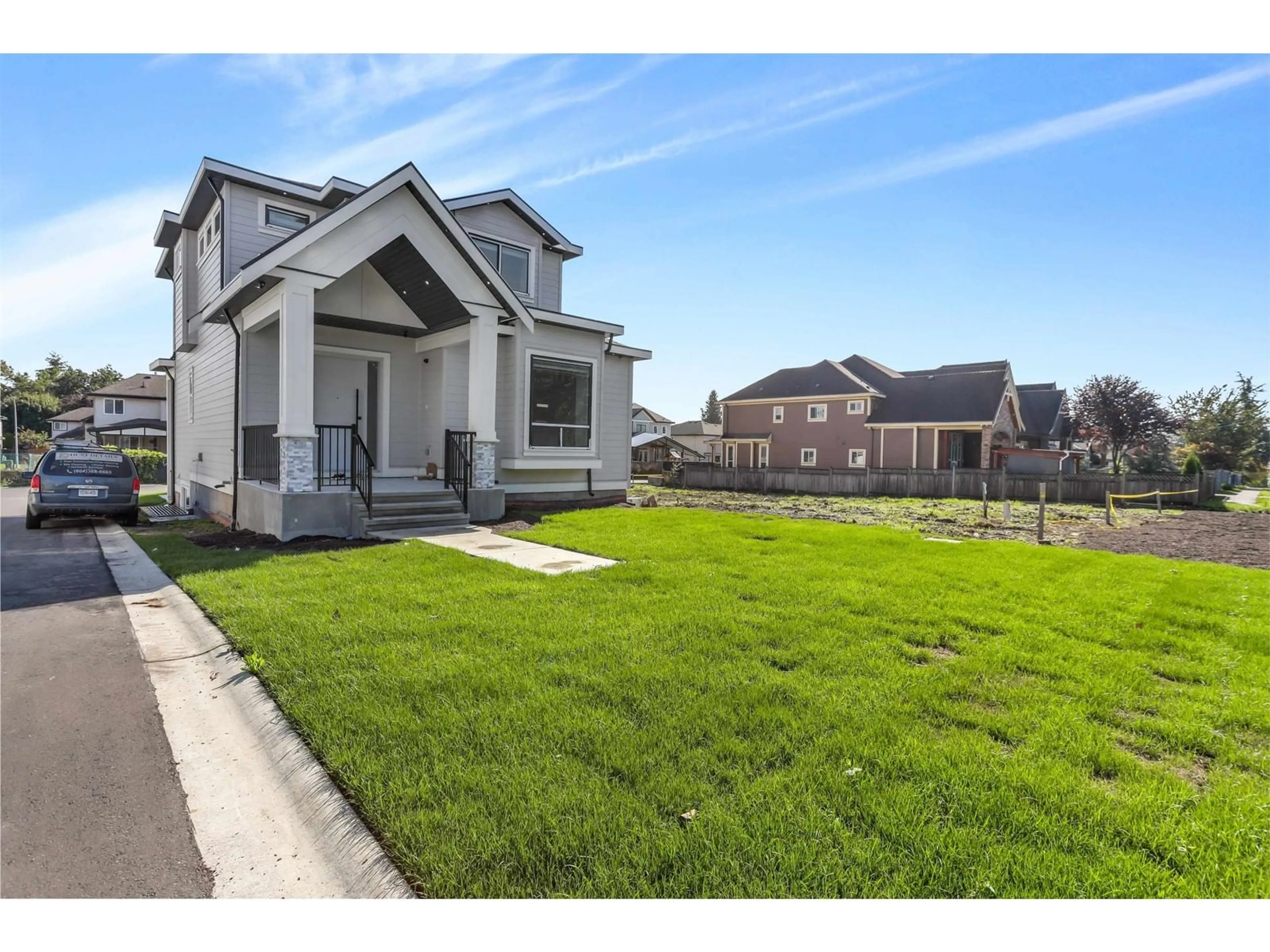 Frontside or backside of a home, the fenced backyard for 5936 168 STREET, Surrey British Columbia V3S3X6