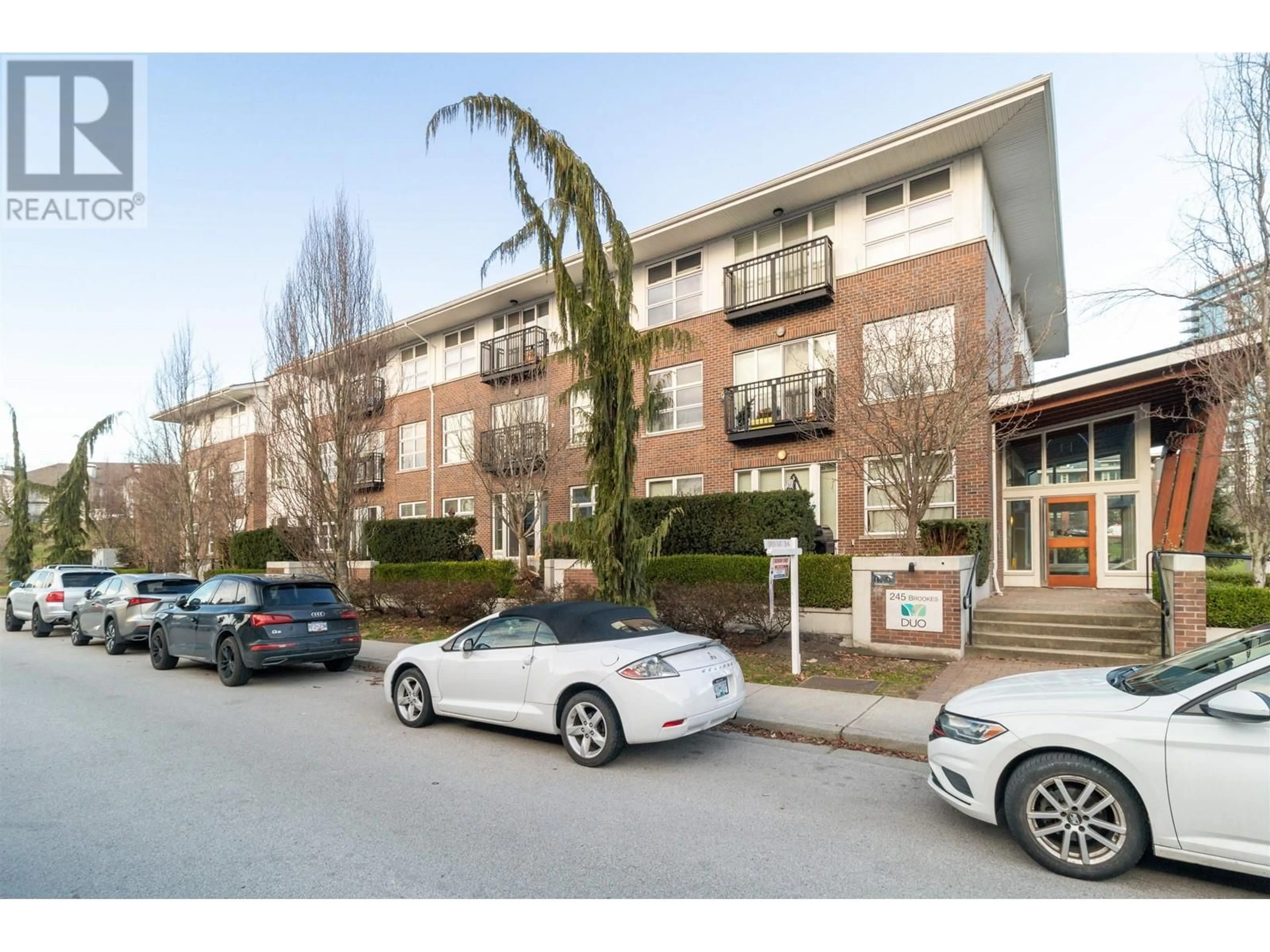 A pic from exterior of the house or condo, the street view for 104 245 BROOKES STREET, New Westminster British Columbia V3M0G5