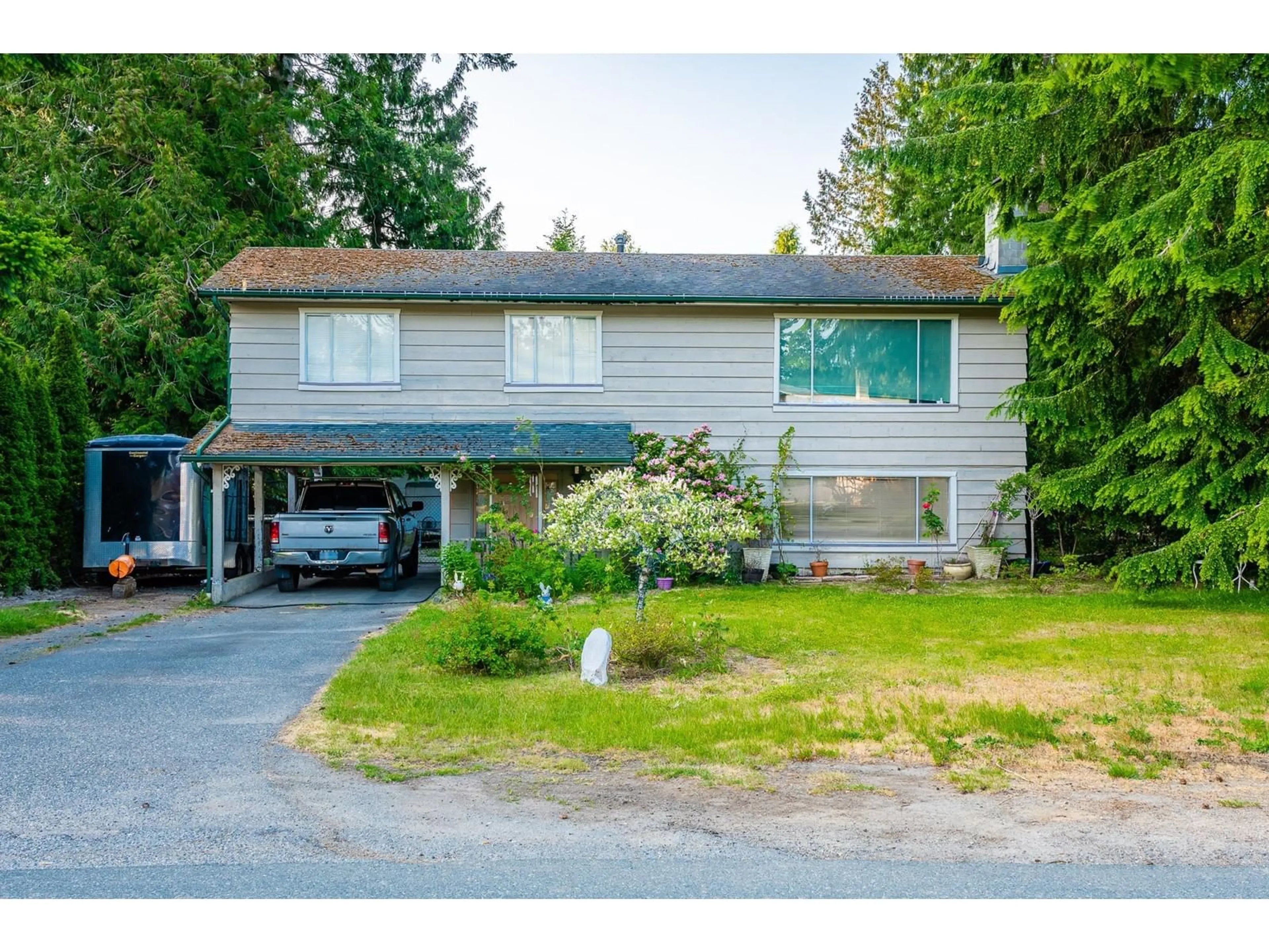 Frontside or backside of a home for 20951 45A AVENUE, Langley British Columbia V3A3G6