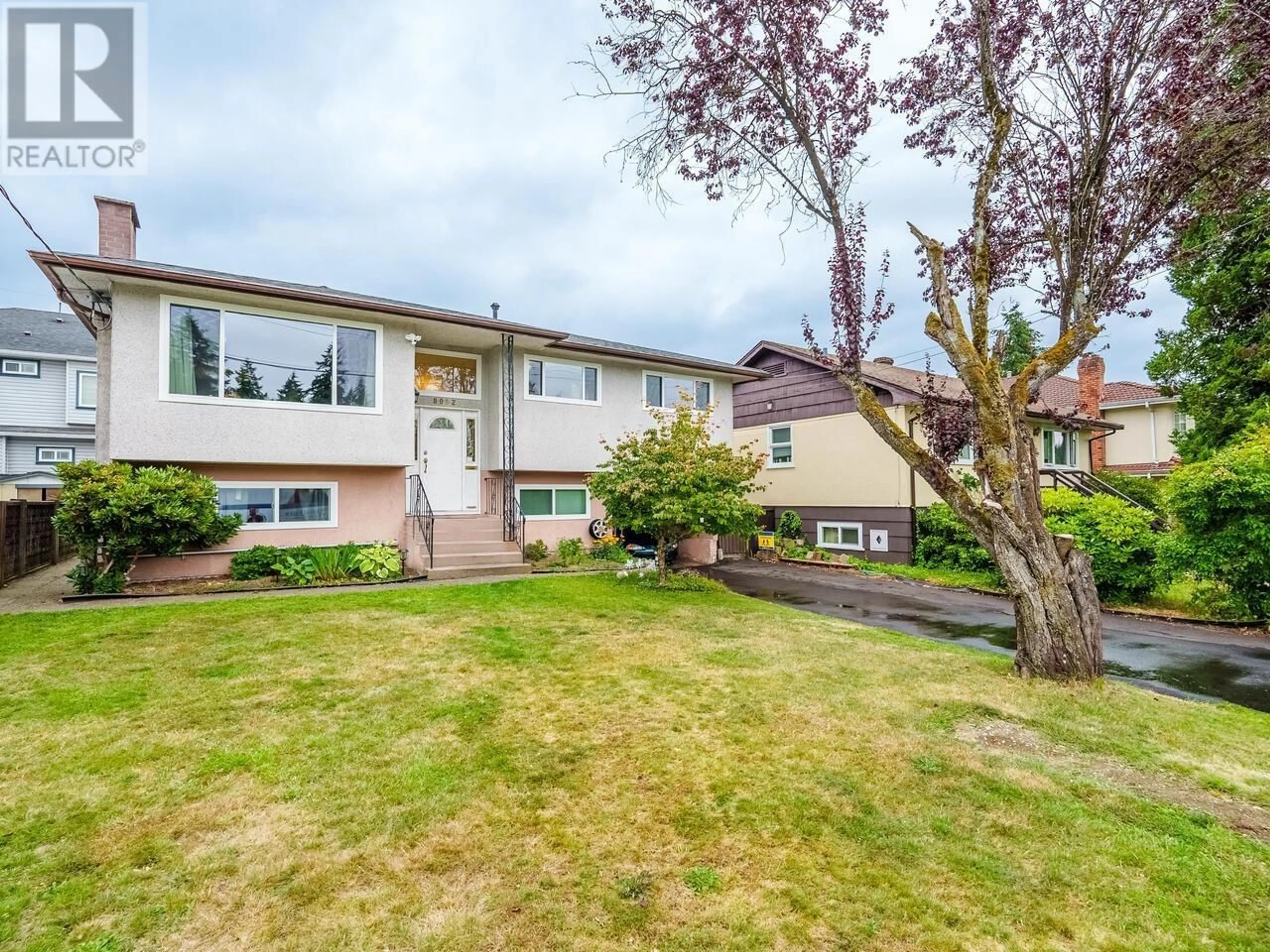 Frontside or backside of a home, the fenced backyard for 8092 18TH AVENUE, Burnaby British Columbia V3N1J8