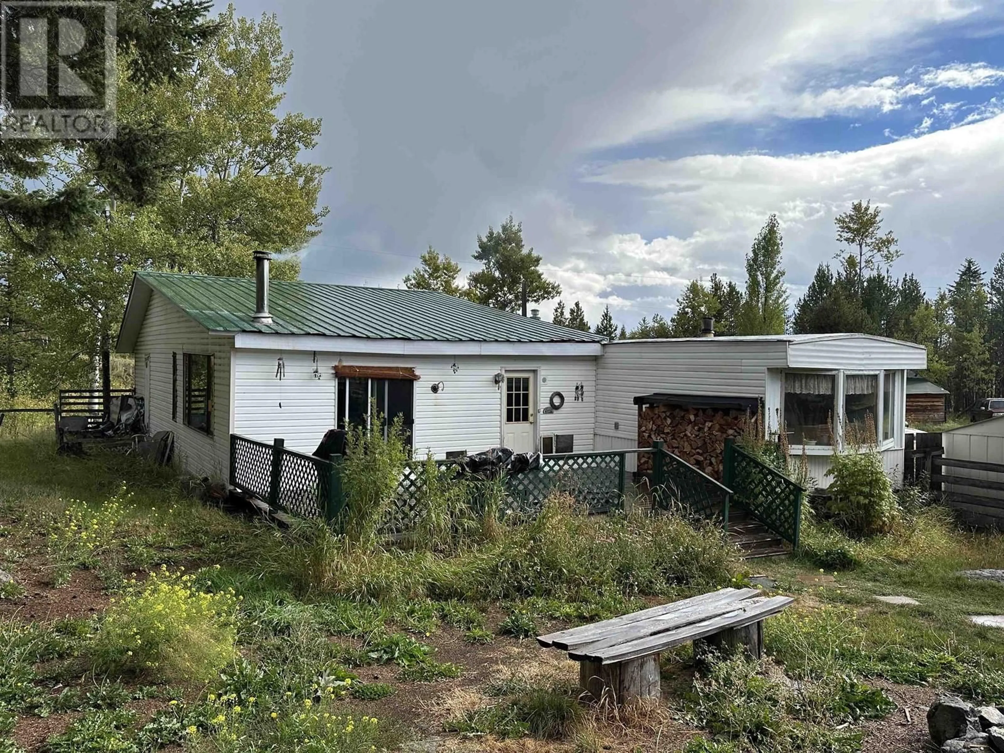 A pic from outside/outdoor area/front of a property/back of a property/a pic from drone, unknown for 7969 SCHERGER ROAD, 70 Mile House British Columbia V0K2K1
