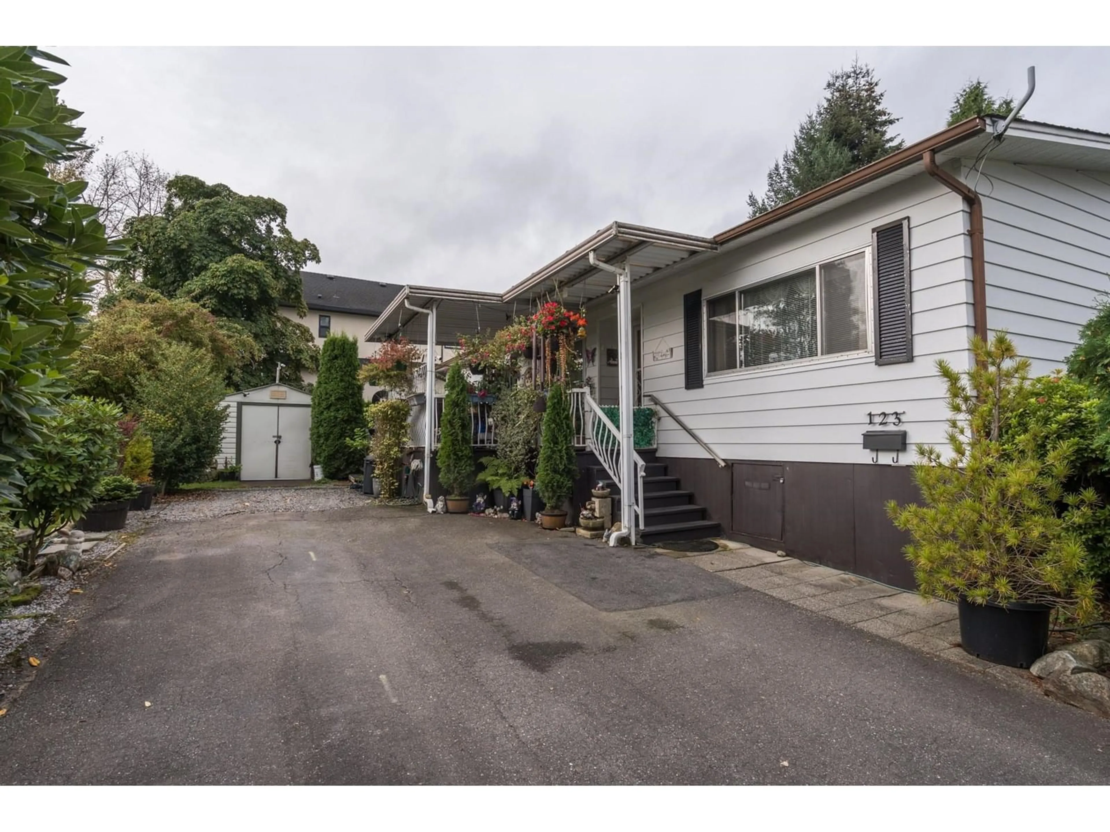 A pic from exterior of the house or condo, the street view for 123 3665 244 STREET, Langley British Columbia V2Z1N1