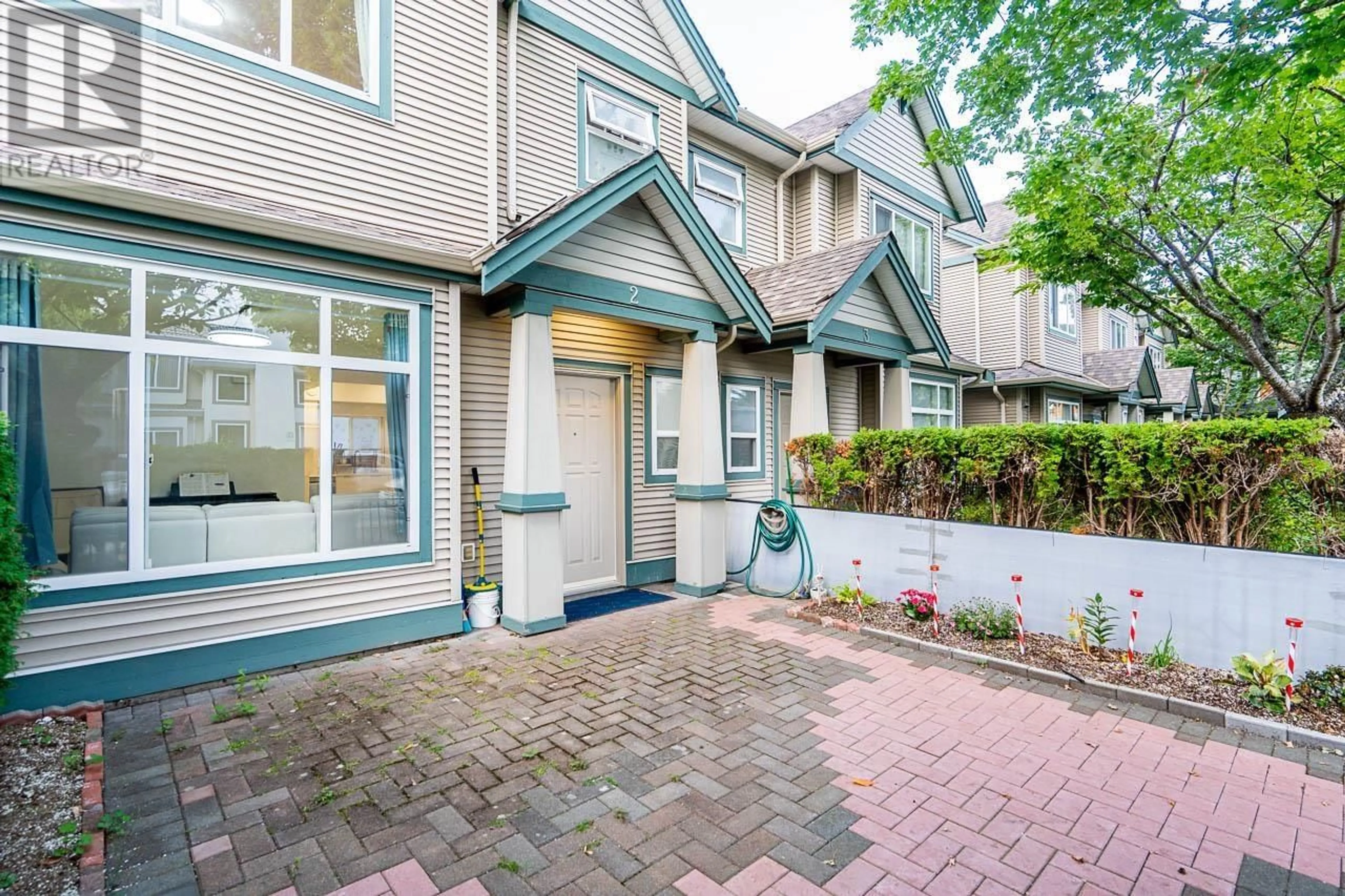 A pic from exterior of the house or condo, cottage for 2 10411 HALL AVENUE, Richmond British Columbia V6X4G7