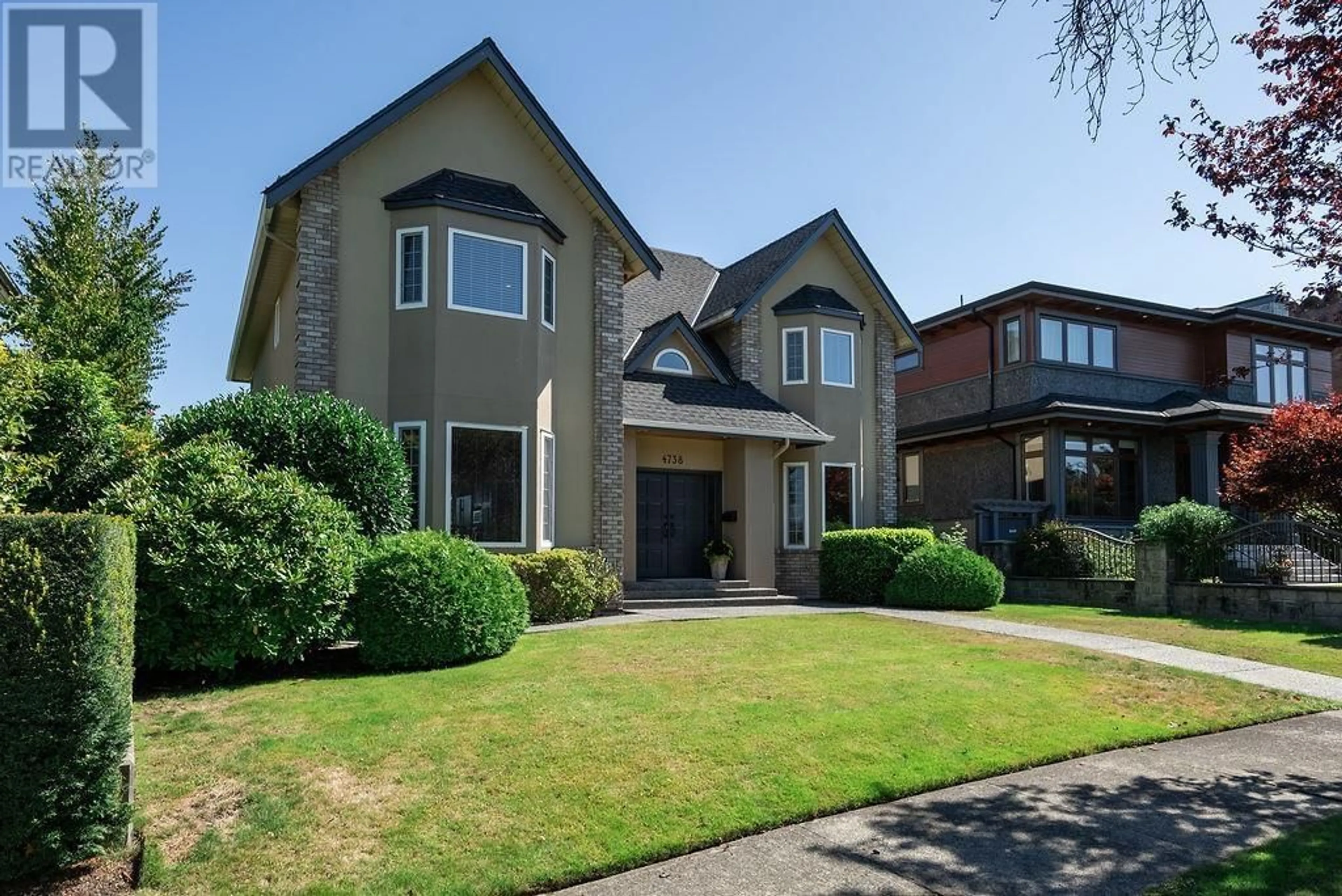 Frontside or backside of a home, the street view for 4738 ELM STREET, Vancouver British Columbia V6L2L3