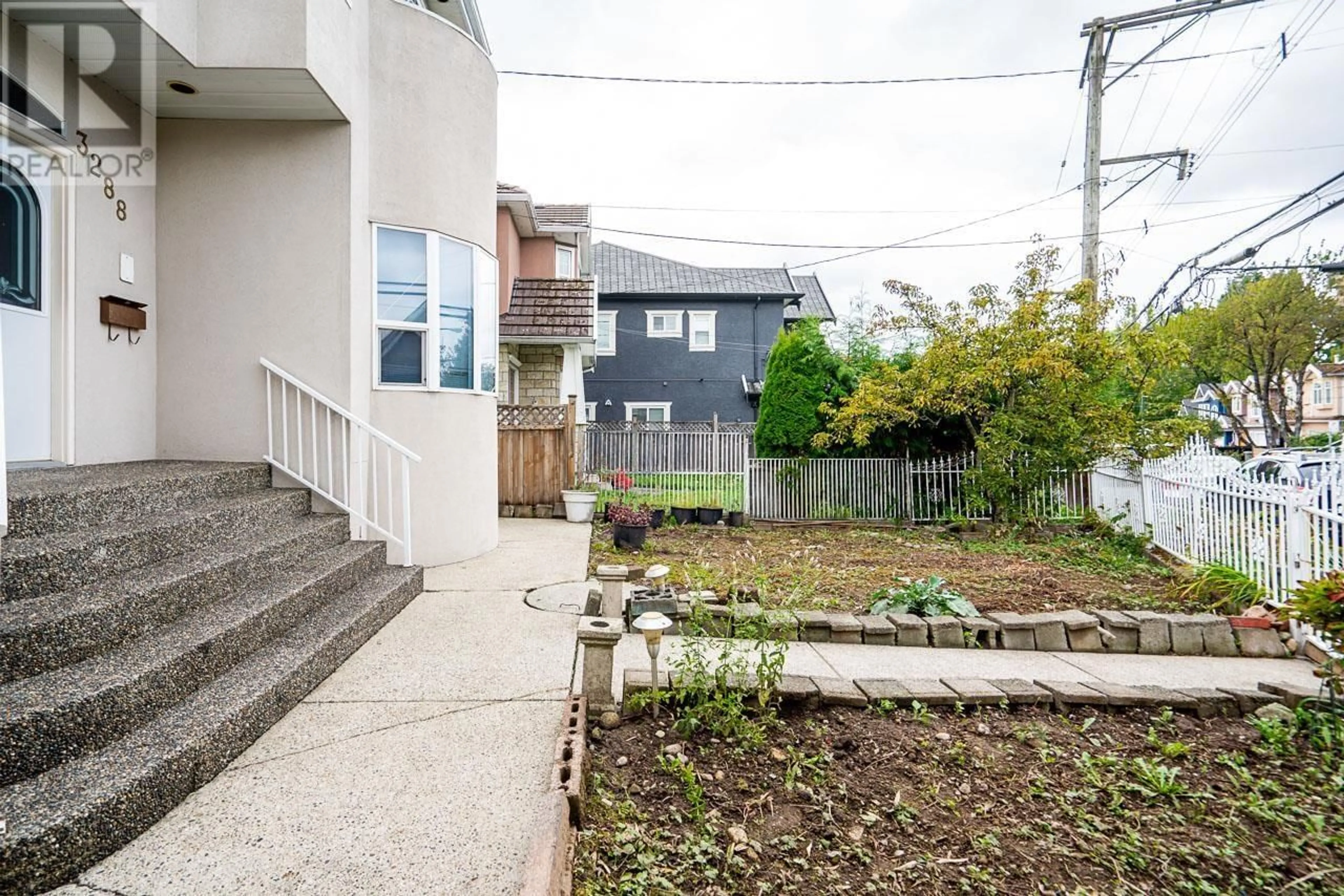 A pic from exterior of the house or condo, the fenced backyard for 3288 SCHOOL AVENUE, Vancouver British Columbia V5R5N5