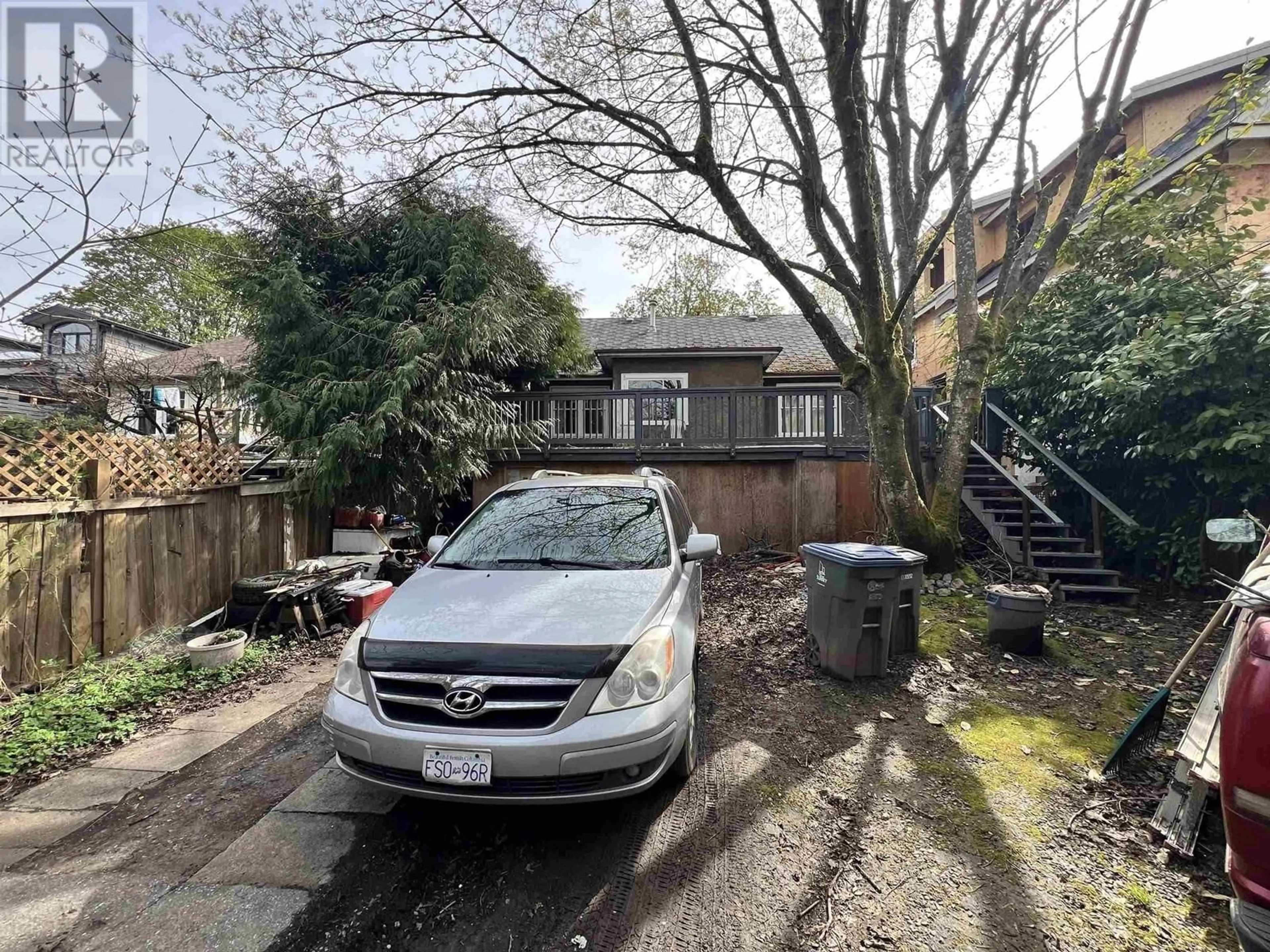 Frontside or backside of a home, the street view for 3159 W 14TH AVENUE, Vancouver British Columbia V6K2X9