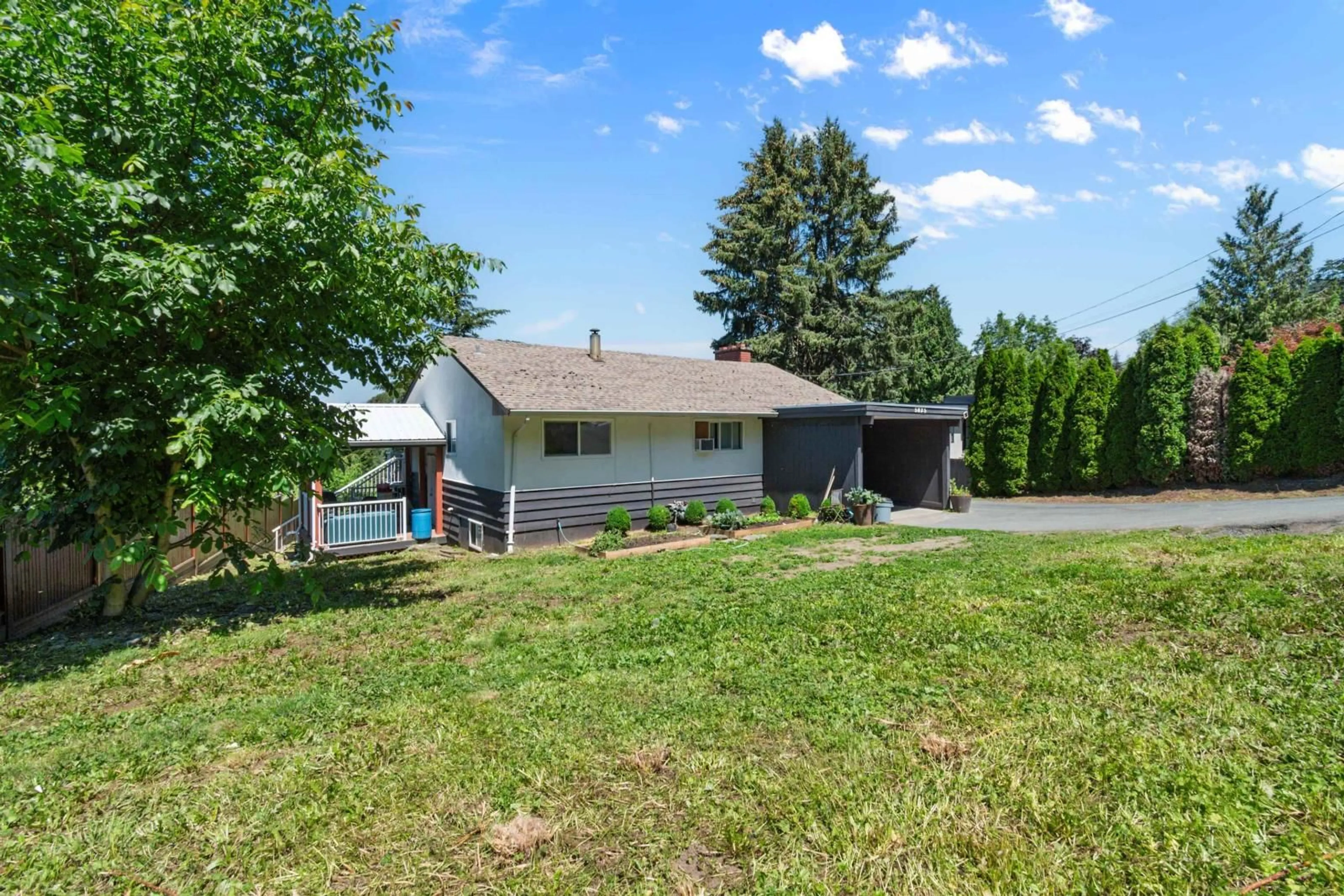 Frontside or backside of a home, the fenced backyard for 5825 JINKERSON ROAD, Chilliwack British Columbia V2R0C8