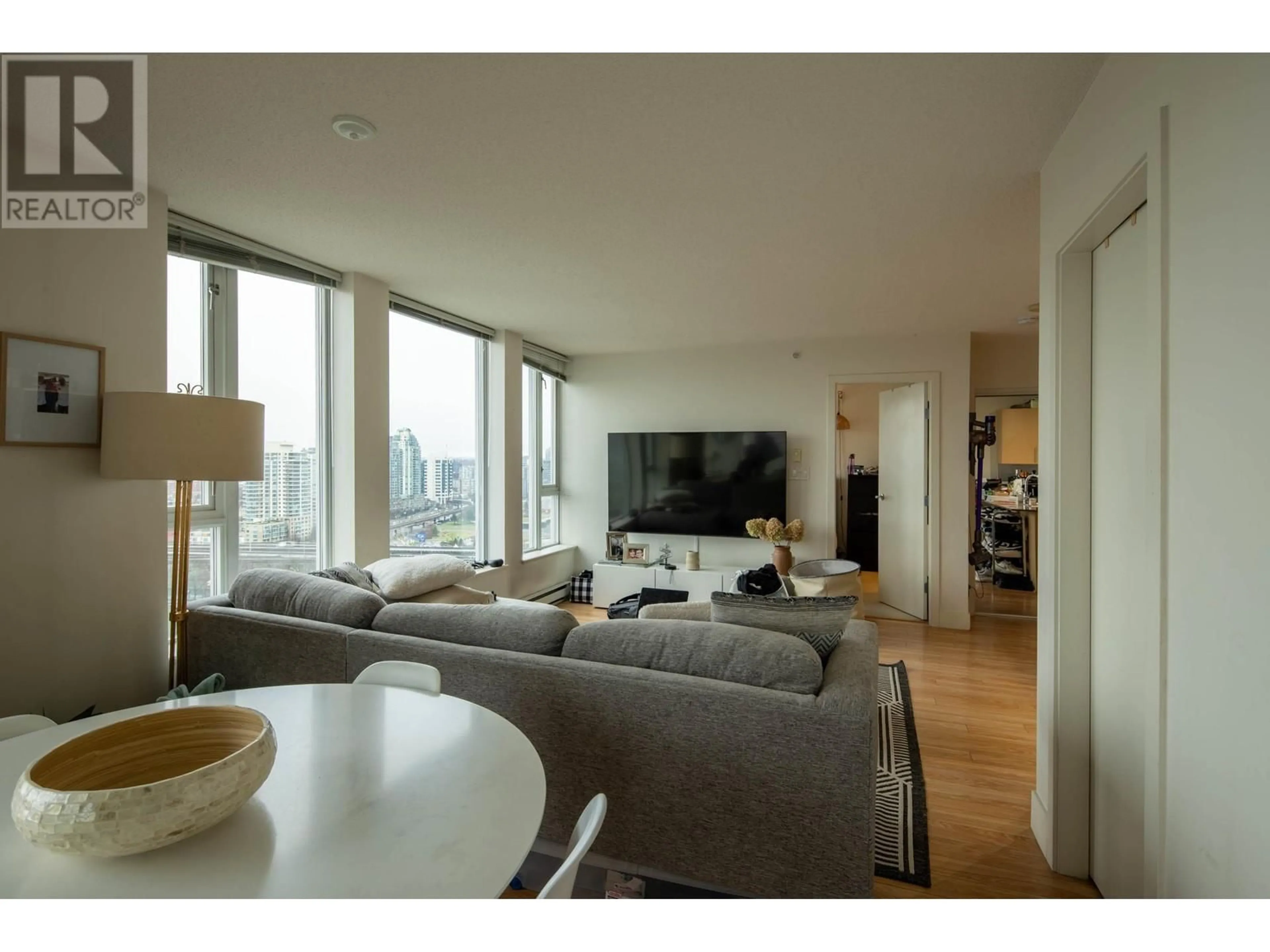 Living room with furniture, wood/laminate floor for 2207 - 550 TAYLOR STREET, Vancouver British Columbia V6B1R1