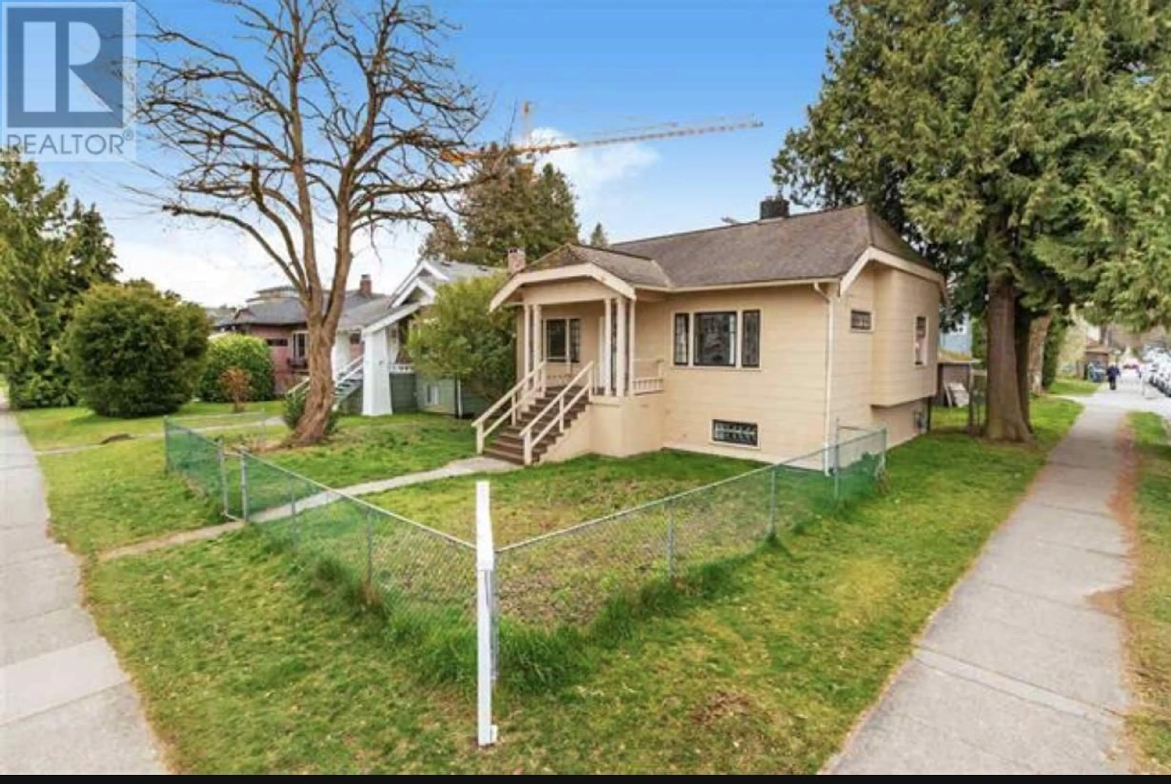 Frontside or backside of a home, the fenced backyard for 3192 W 8TH AVENUE, Vancouver British Columbia V6K2C3