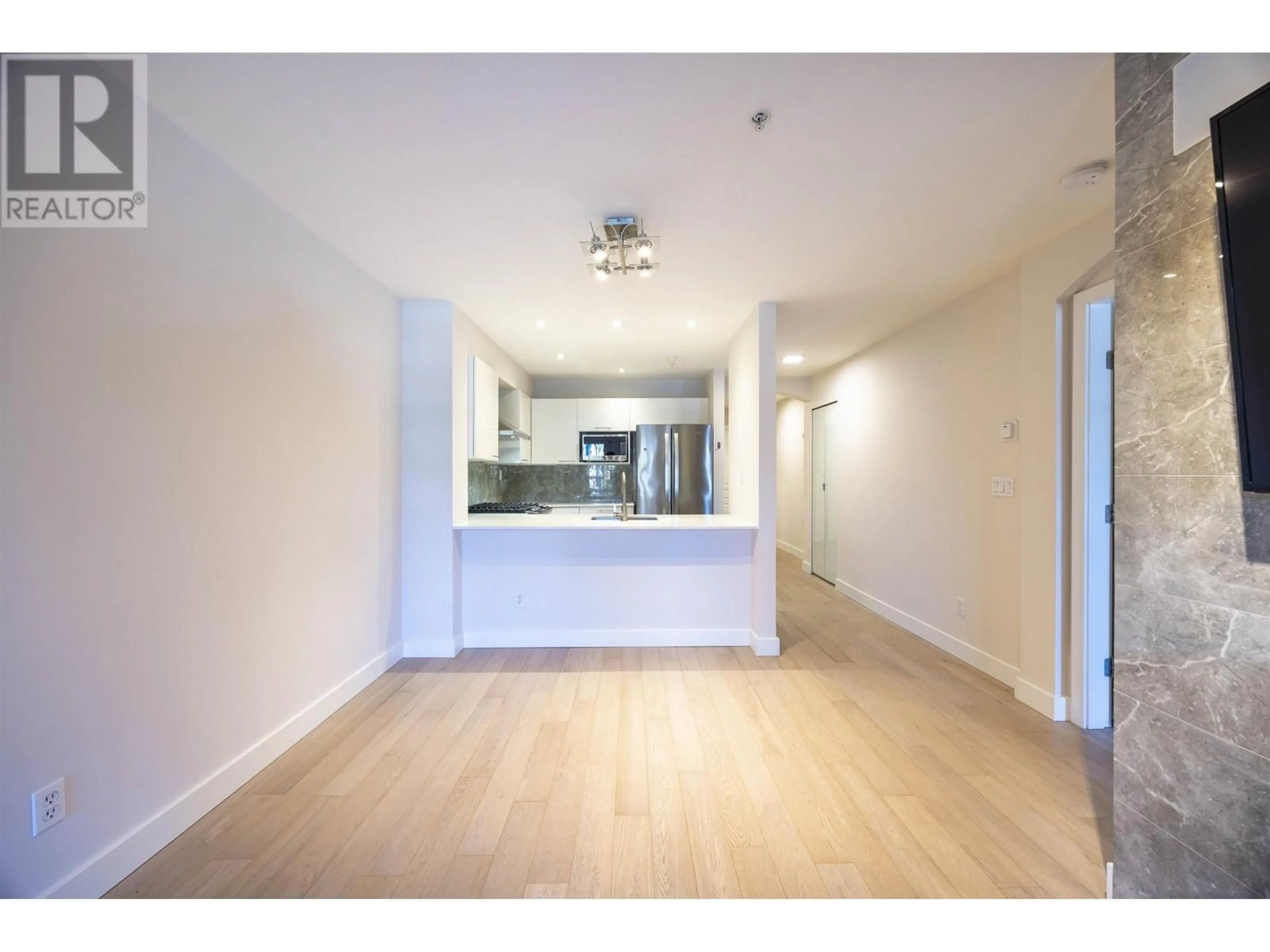 Other indoor space, wood floors for 310 5723 COLLINGWOOD STREET, Vancouver British Columbia V6N4K6