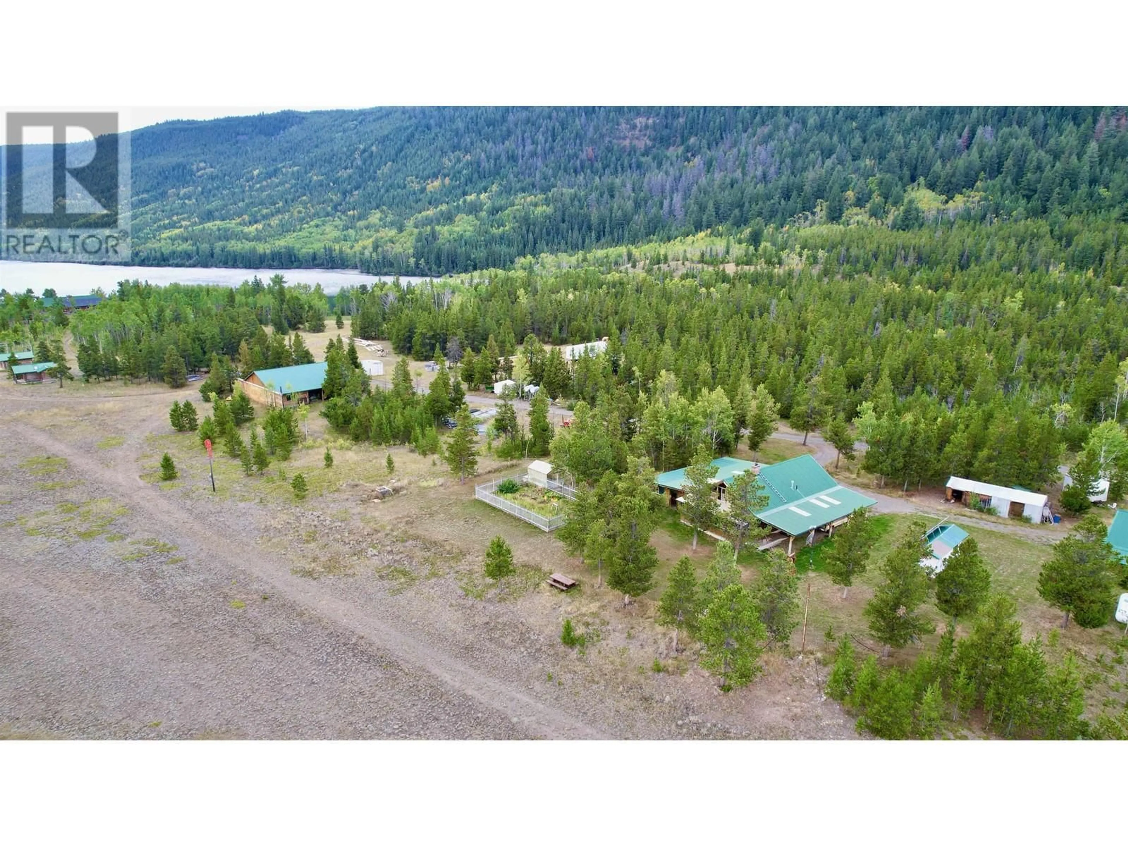 A pic from outside/outdoor area/front of a property/back of a property/a pic from drone, water/lake/river/ocean view for 7650 VEDAN-ELKIN LAKE FSR ROAD, Williams Lake British Columbia V0L1X0