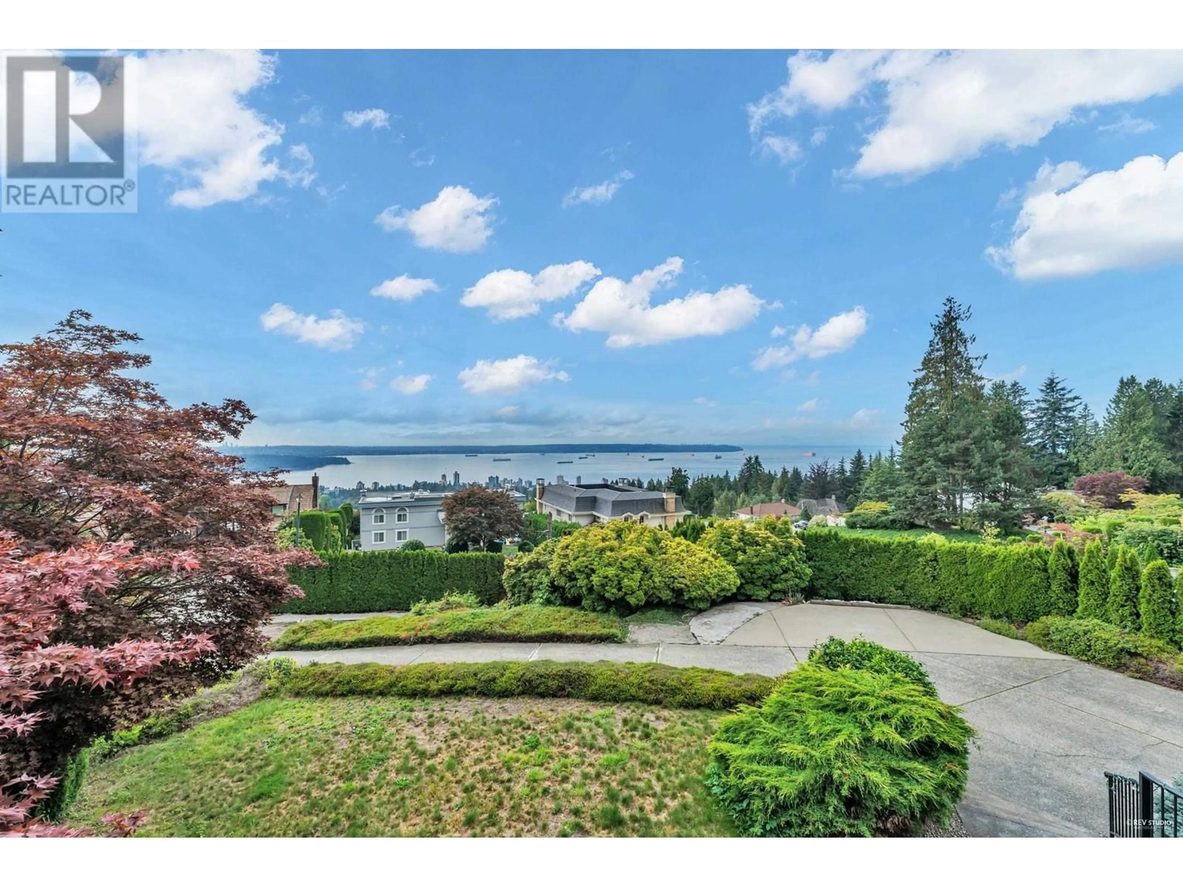 A pic from exterior of the house or condo, the fenced backyard for 2171 WESTHILL WYND, West Vancouver British Columbia V7S2Z3