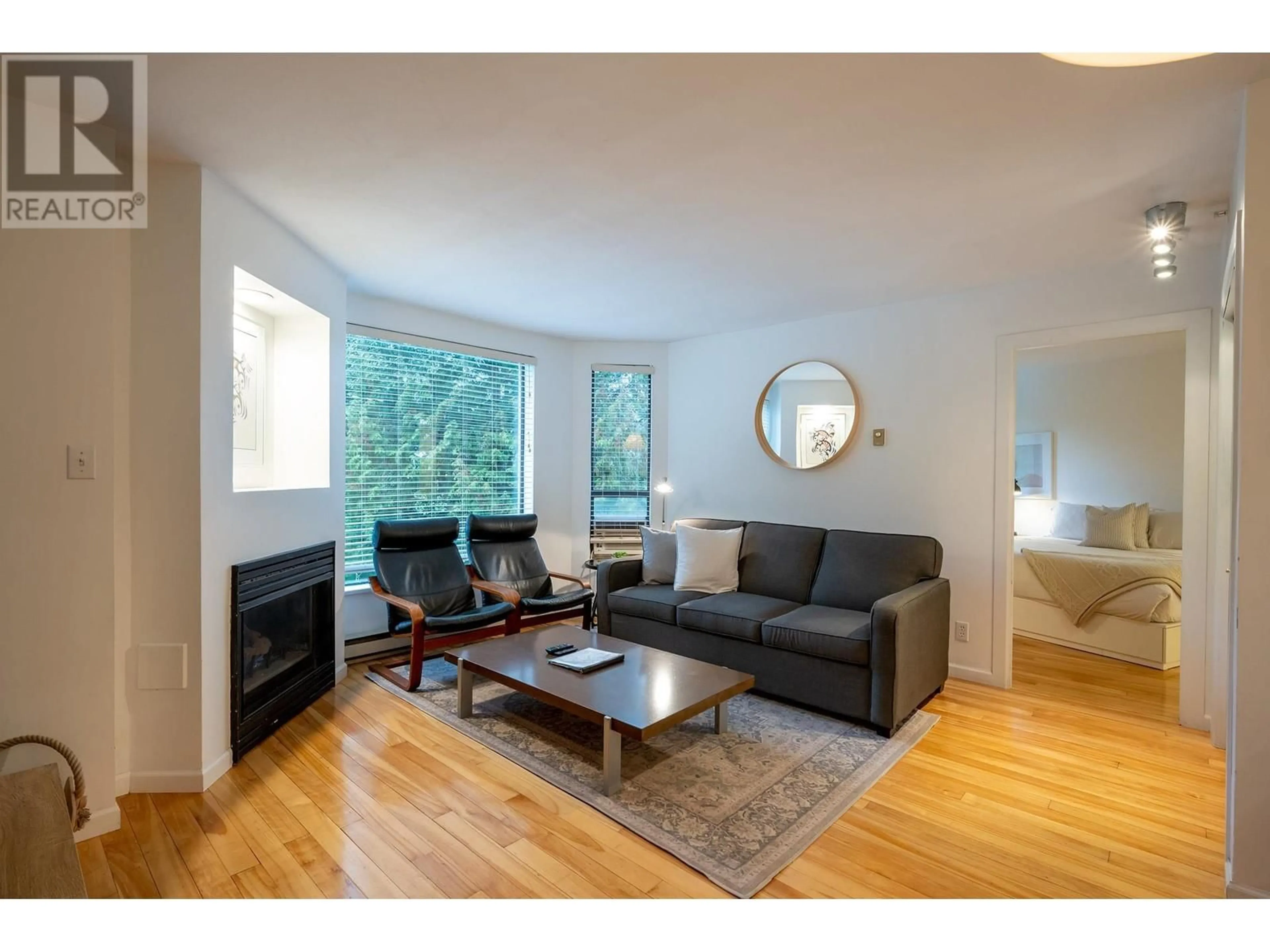 Living room, wood floors for 211 4809 SPEARHEAD DRIVE, Whistler British Columbia V0N1B4