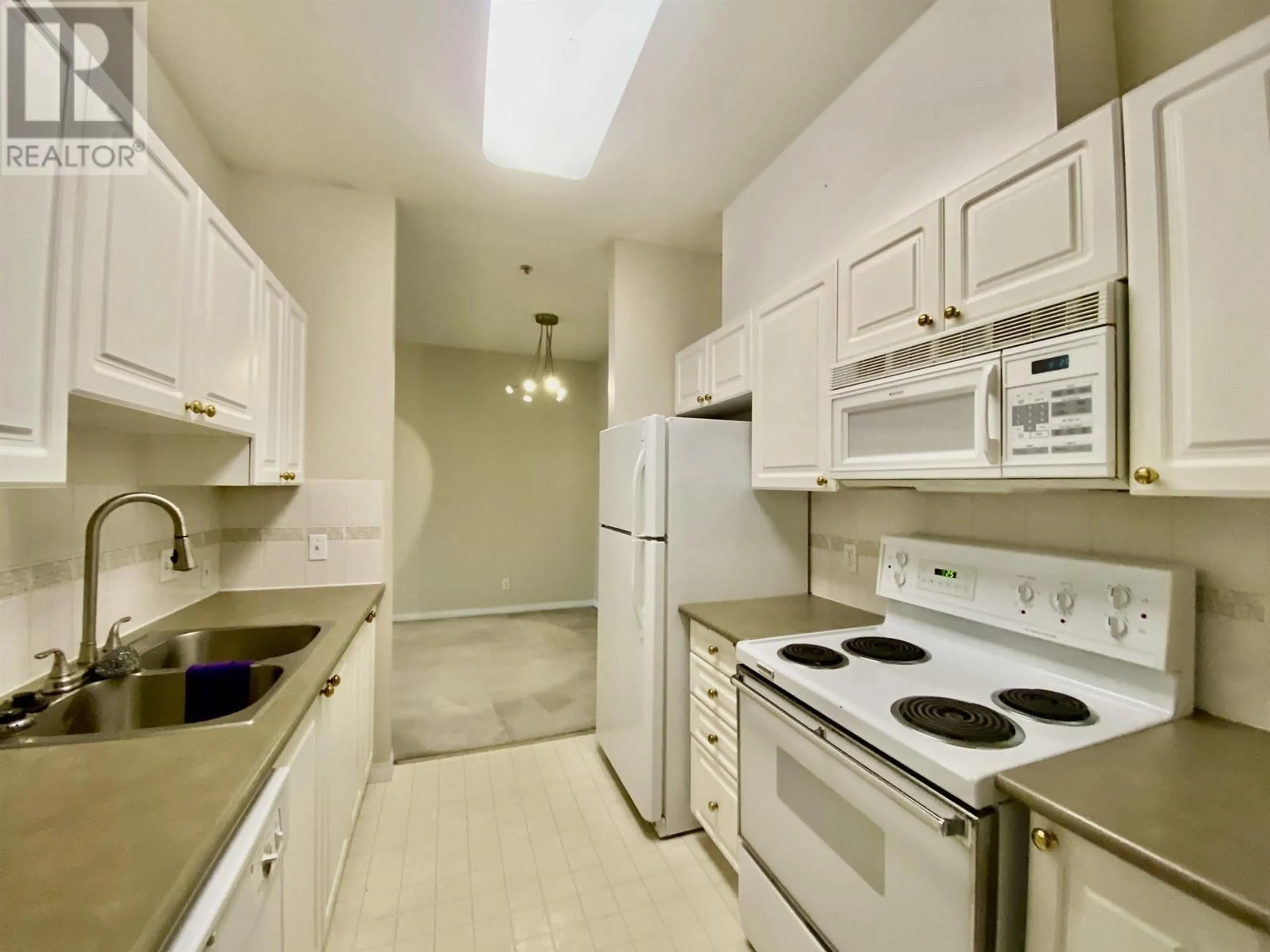 Standard kitchen, unknown floor for 409 4768 53 STREET, Delta British Columbia V4K5B2