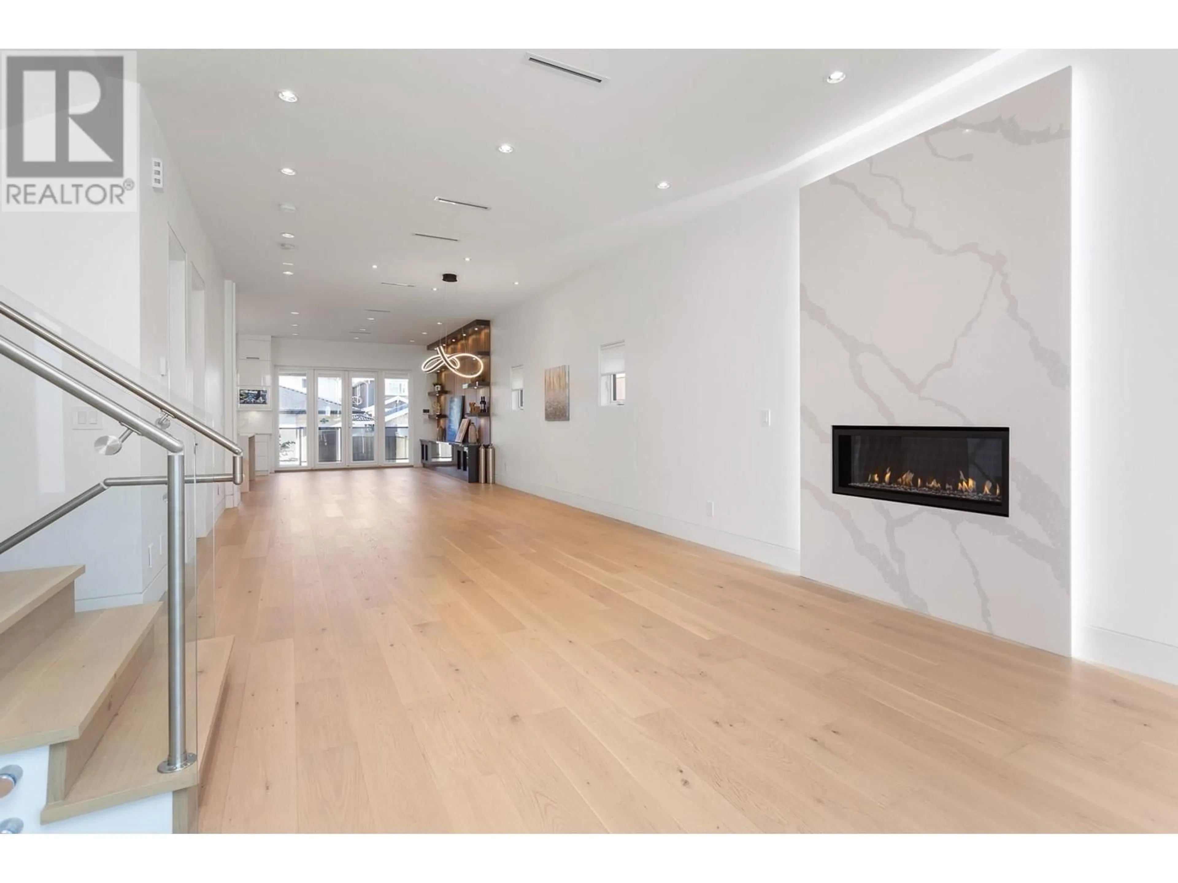 Indoor lobby, wood floors for 4346 PENDER STREET, Burnaby British Columbia V5C2M6