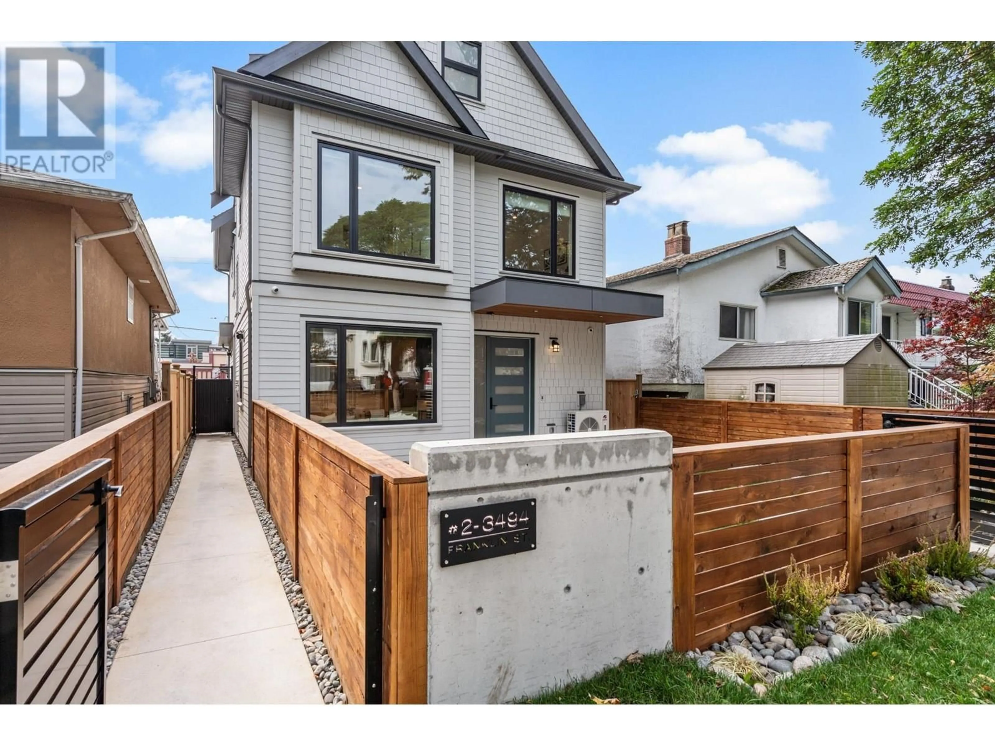 Frontside or backside of a home, the fenced backyard for 2 3494 FRANKLIN STREET, Vancouver British Columbia V5K1Y3