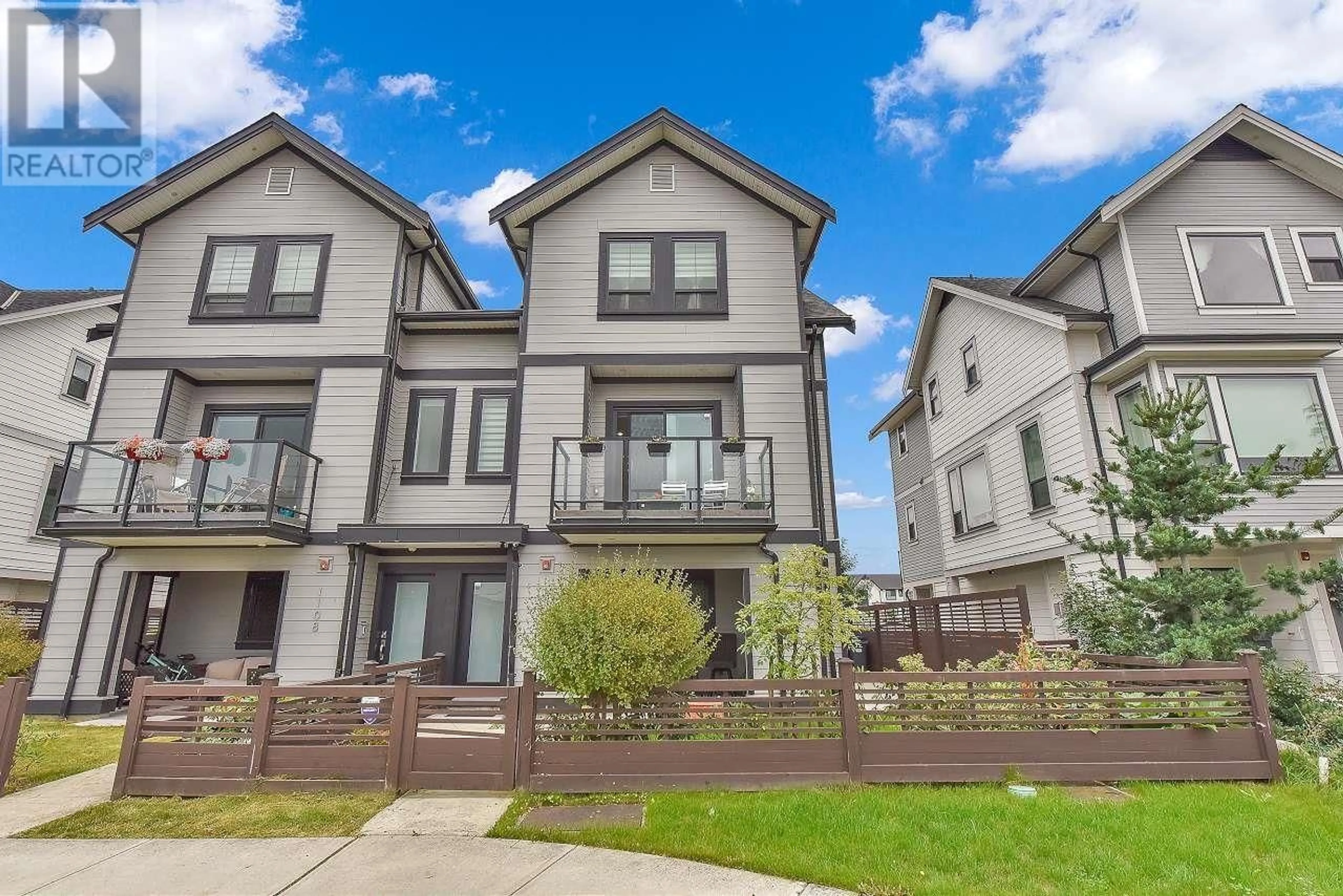 A pic from exterior of the house or condo, the fenced backyard for 1112 SALTER STREET, New Westminster British Columbia V3M0M4