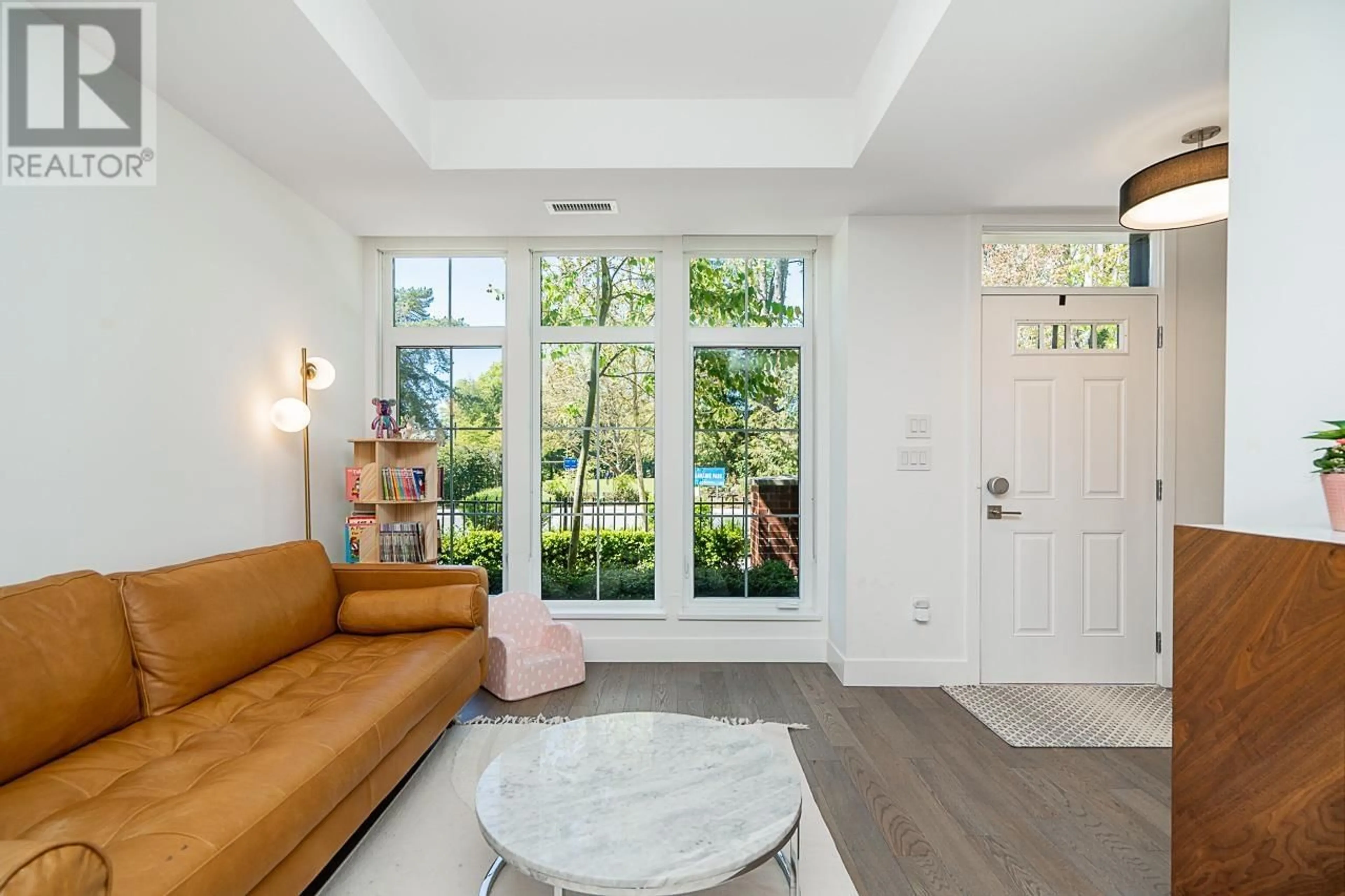 Indoor entryway, wood floors for 119 2070 CURLING ROAD, North Vancouver British Columbia V7P0C9