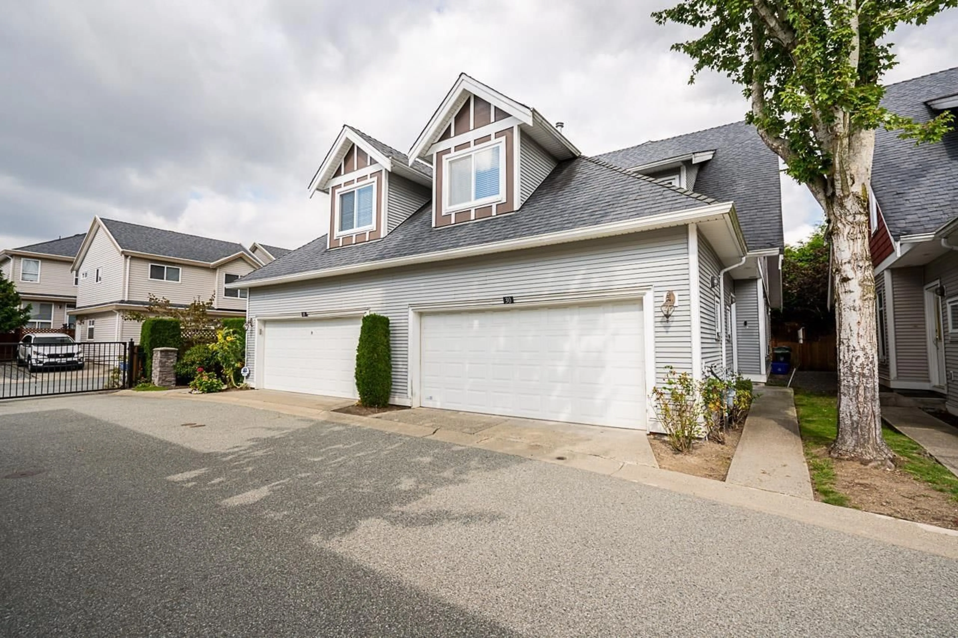 A pic from exterior of the house or condo, the street view for 30 19977 71 AVENUE, Langley British Columbia V2Y0E1