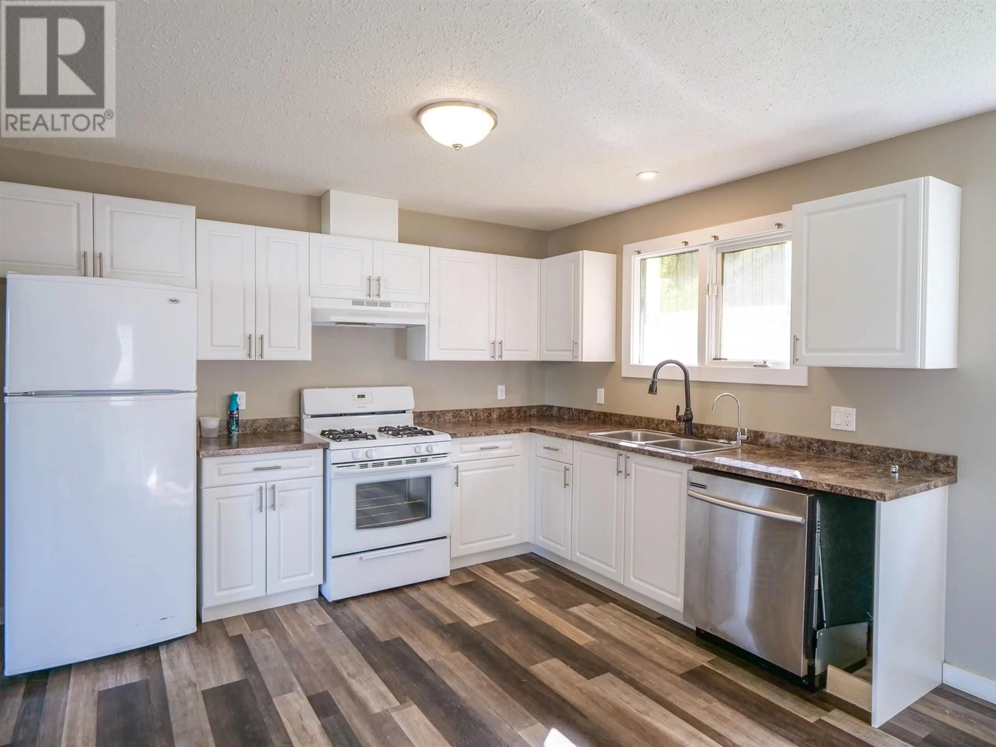 Standard kitchen, wood floors, cottage for 489 ADAM STREET, Quesnel British Columbia V2J5H5