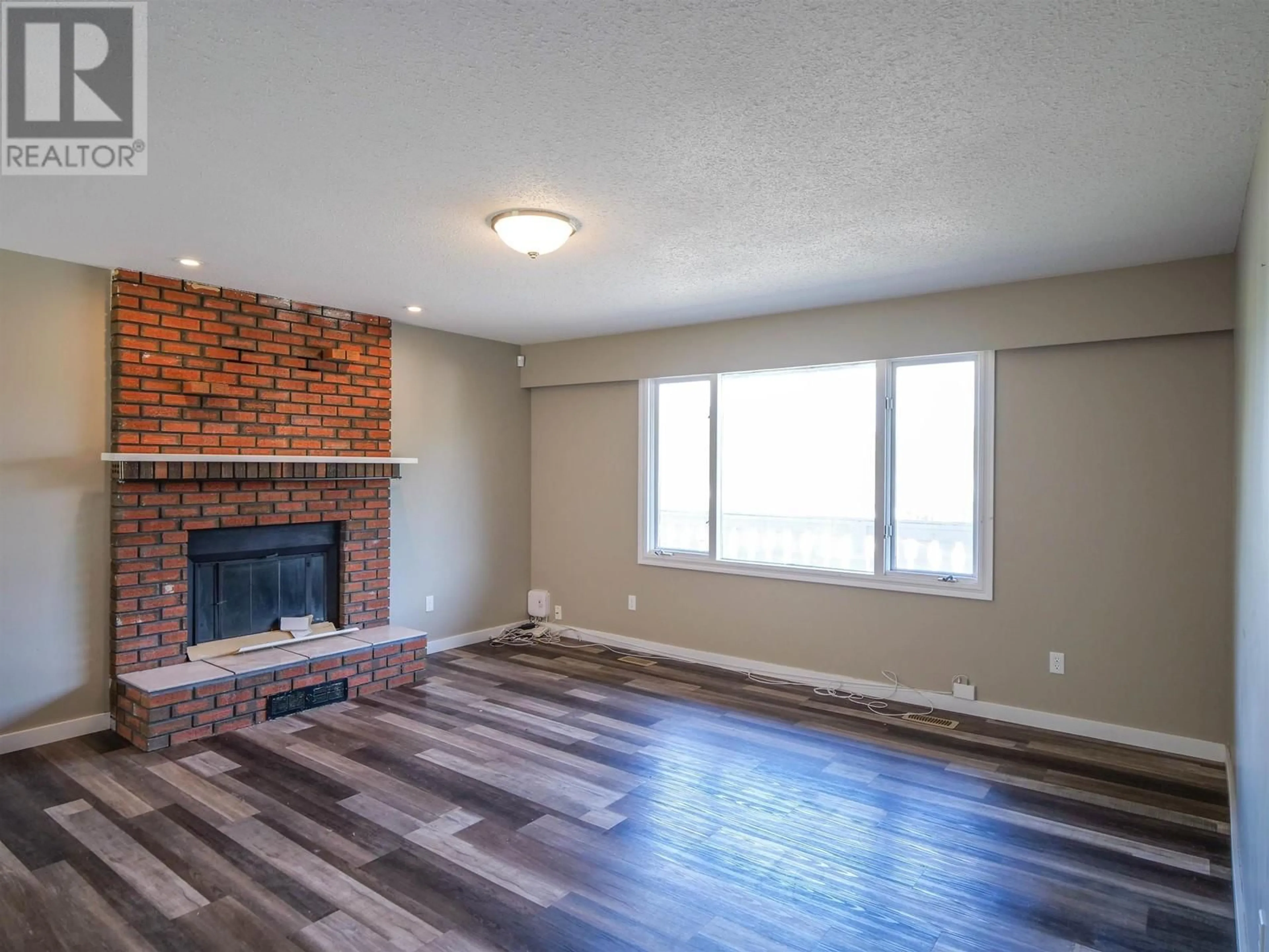 Living room, wood floors for 489 ADAM STREET, Quesnel British Columbia V2J5H5