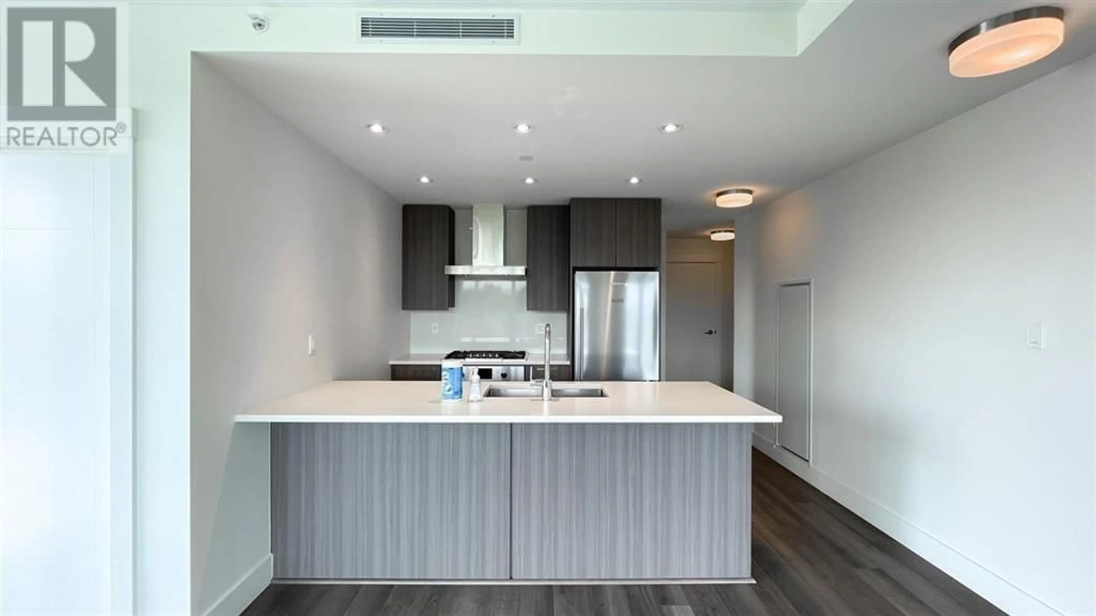 Open concept kitchen for 307 10788 NO. 5 ROAD, Richmond British Columbia V6W0B7