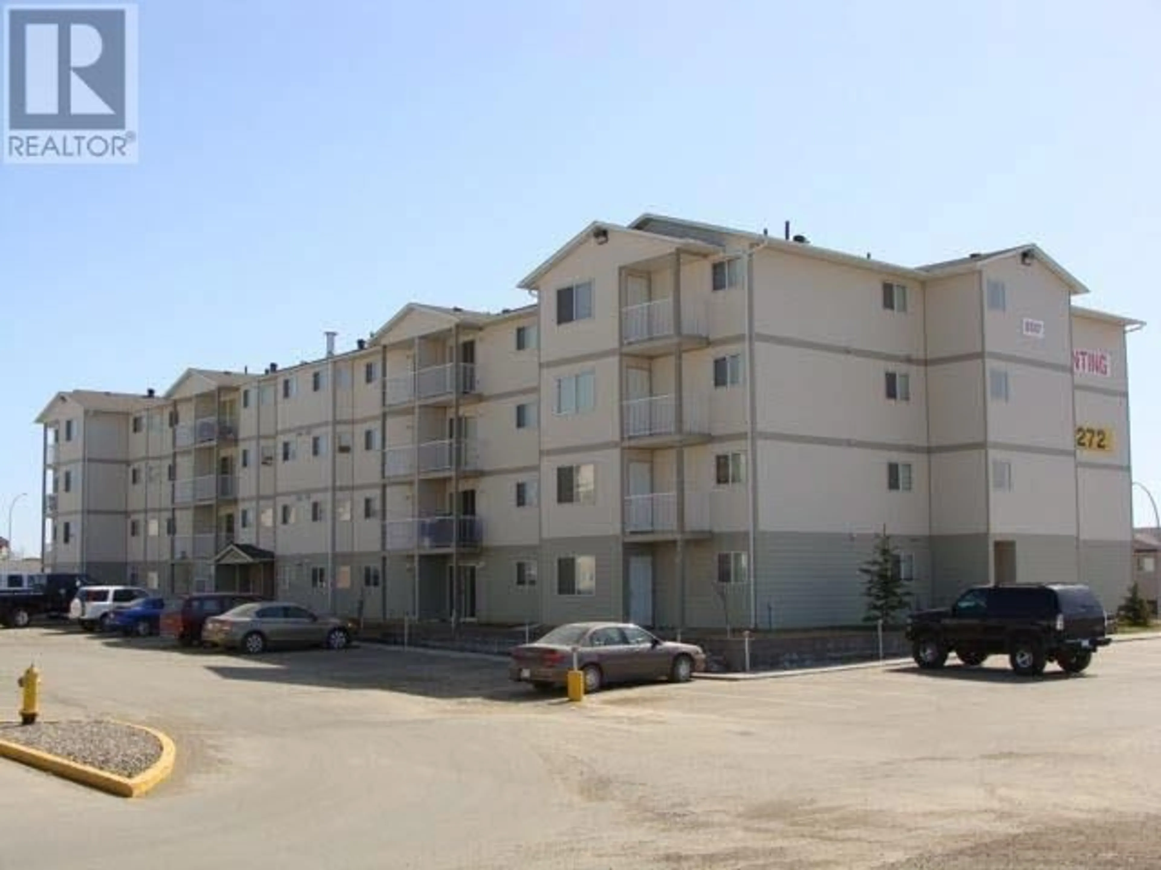 A pic from exterior of the house or condo, the front or back of building for 404 8507 86 STREET, Fort St. John British Columbia V1J0E4