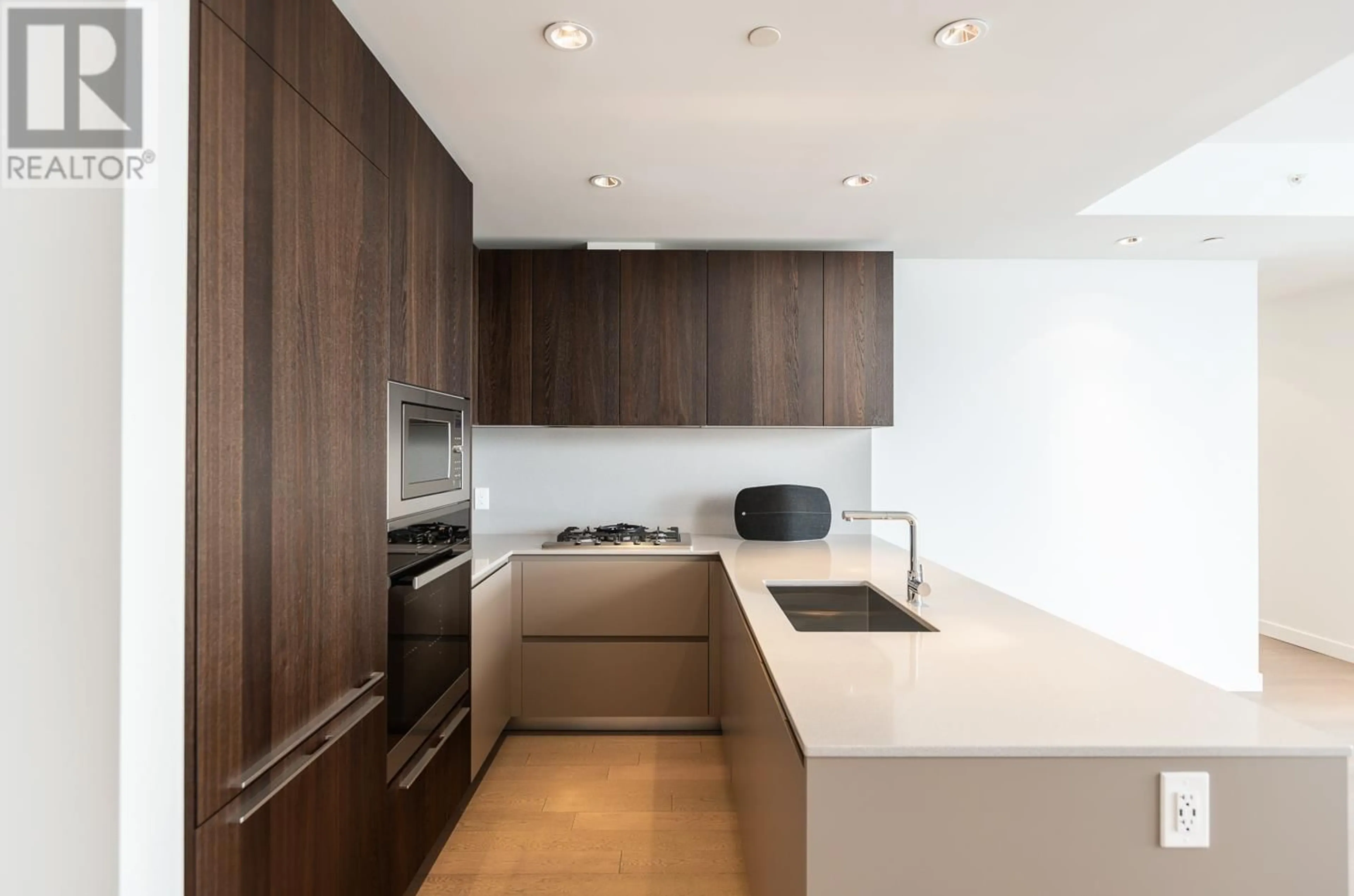 Contemporary kitchen, wood/laminate floor for 809 6622 PEARSON WAY, Richmond British Columbia V7C0E4