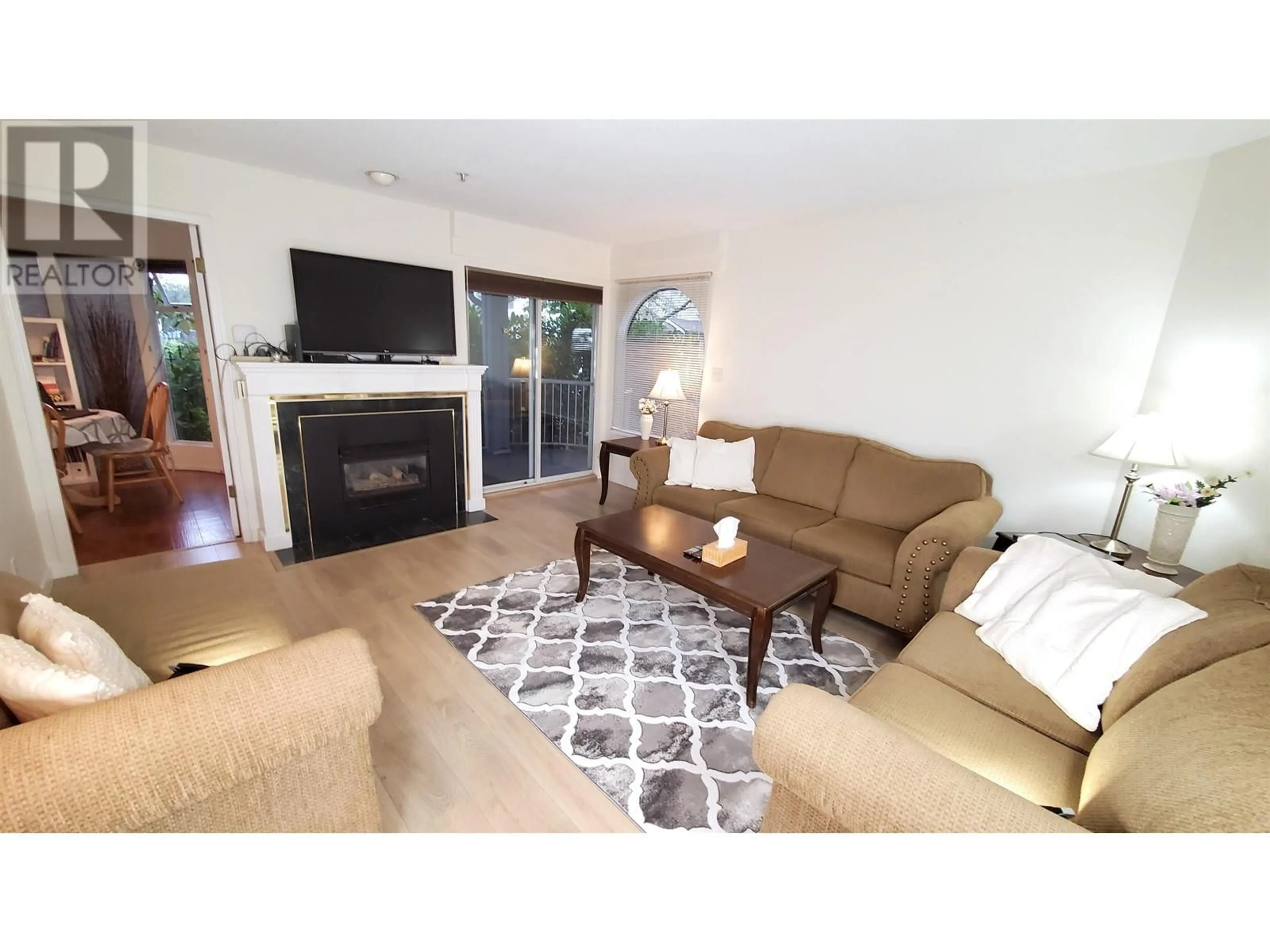 Living room, carpet floors for 107 7520 COLUMBIA STREET, Vancouver British Columbia V5X4S8