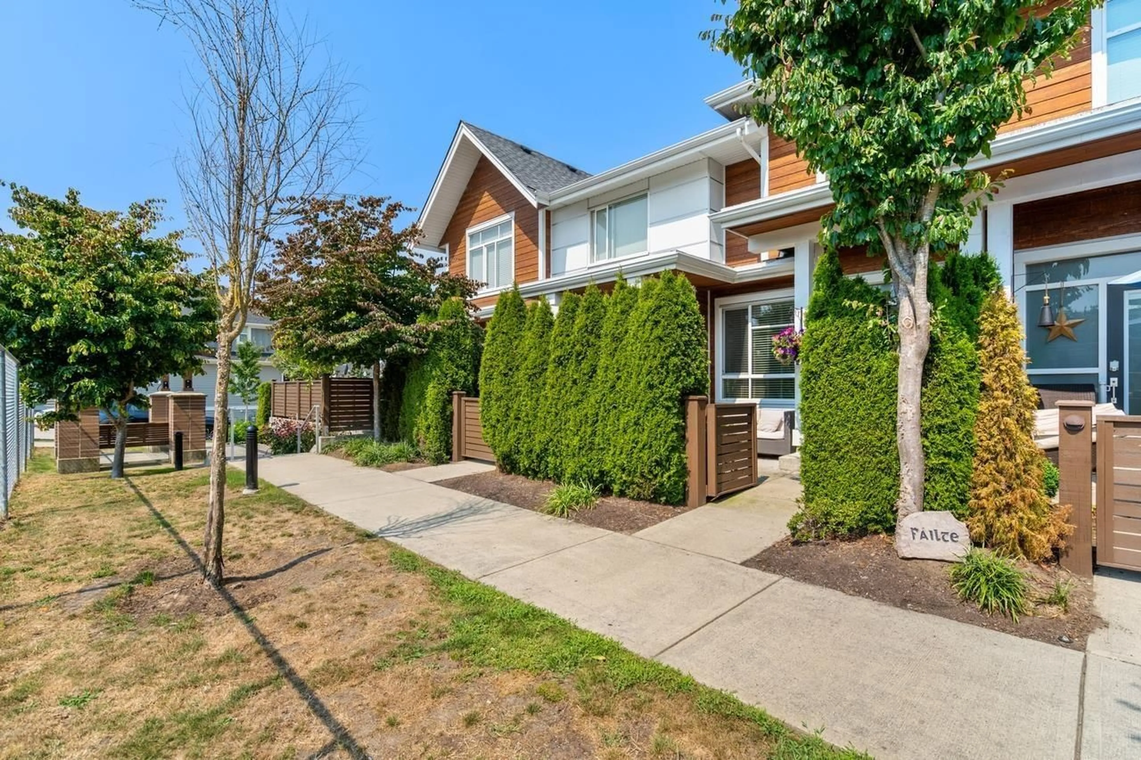 A pic from exterior of the house or condo, the fenced backyard for 3 2958 159 STREET, Surrey British Columbia V3Z0R1