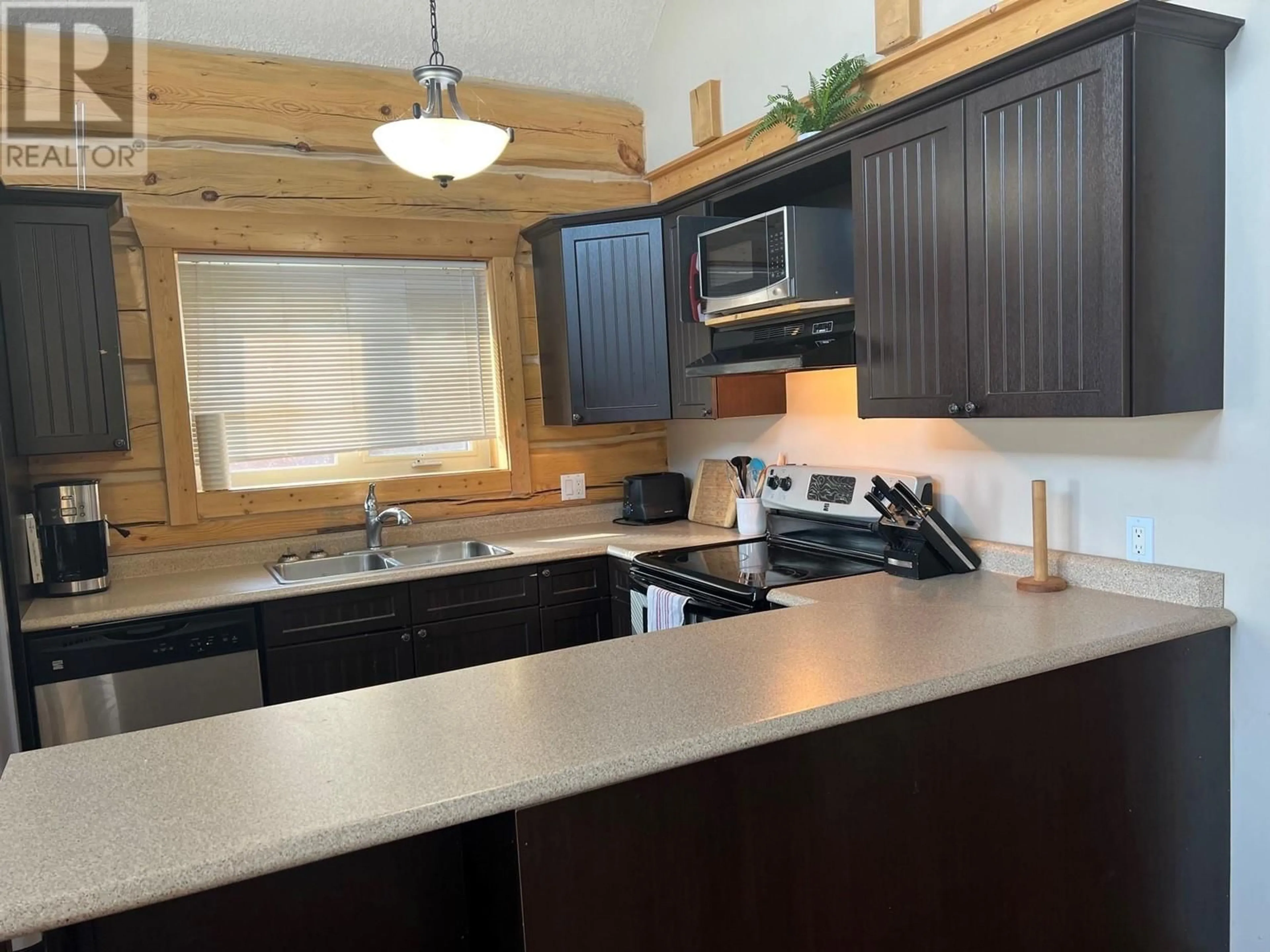 Standard kitchen, wood floors, cottage for 10407 LEMIEUX STREET, Hudsons Hope British Columbia V0C1V0