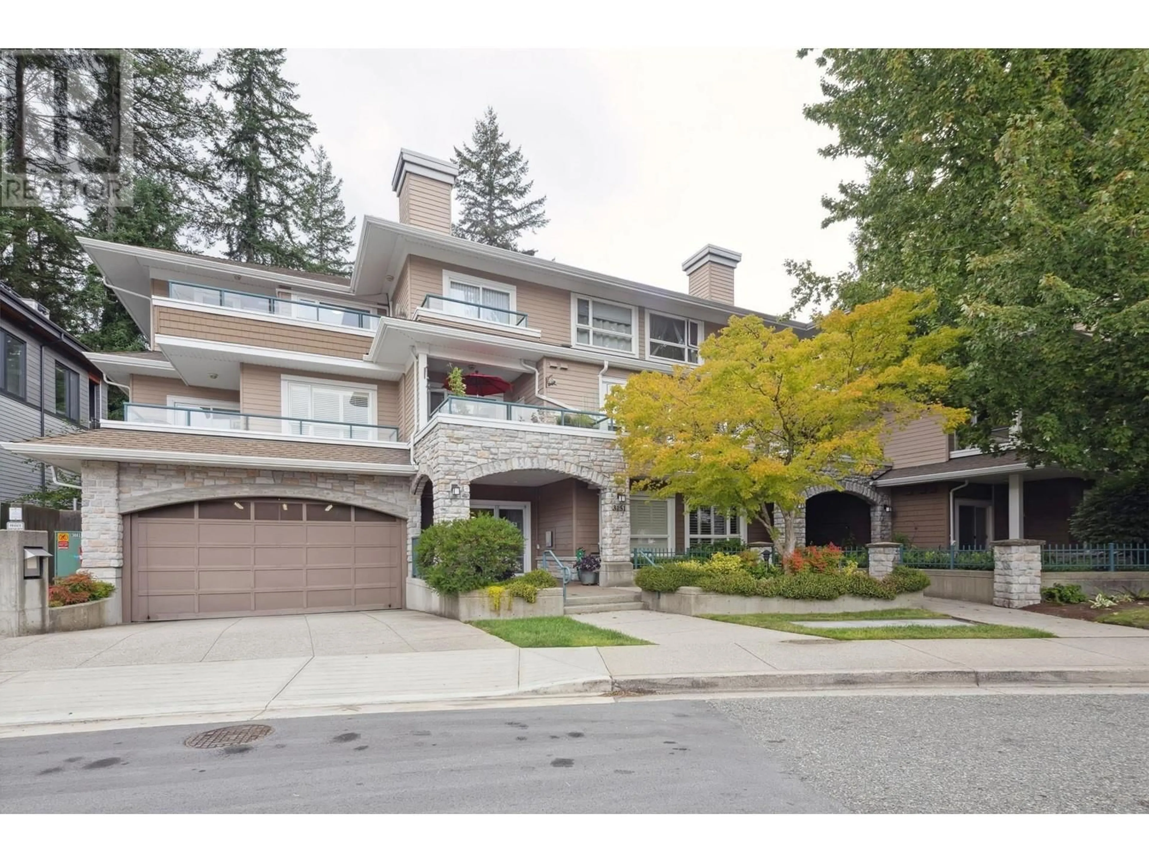 A pic from exterior of the house or condo, the street view for 105 3151 CONNAUGHT CRESCENT, North Vancouver British Columbia V7R4X6