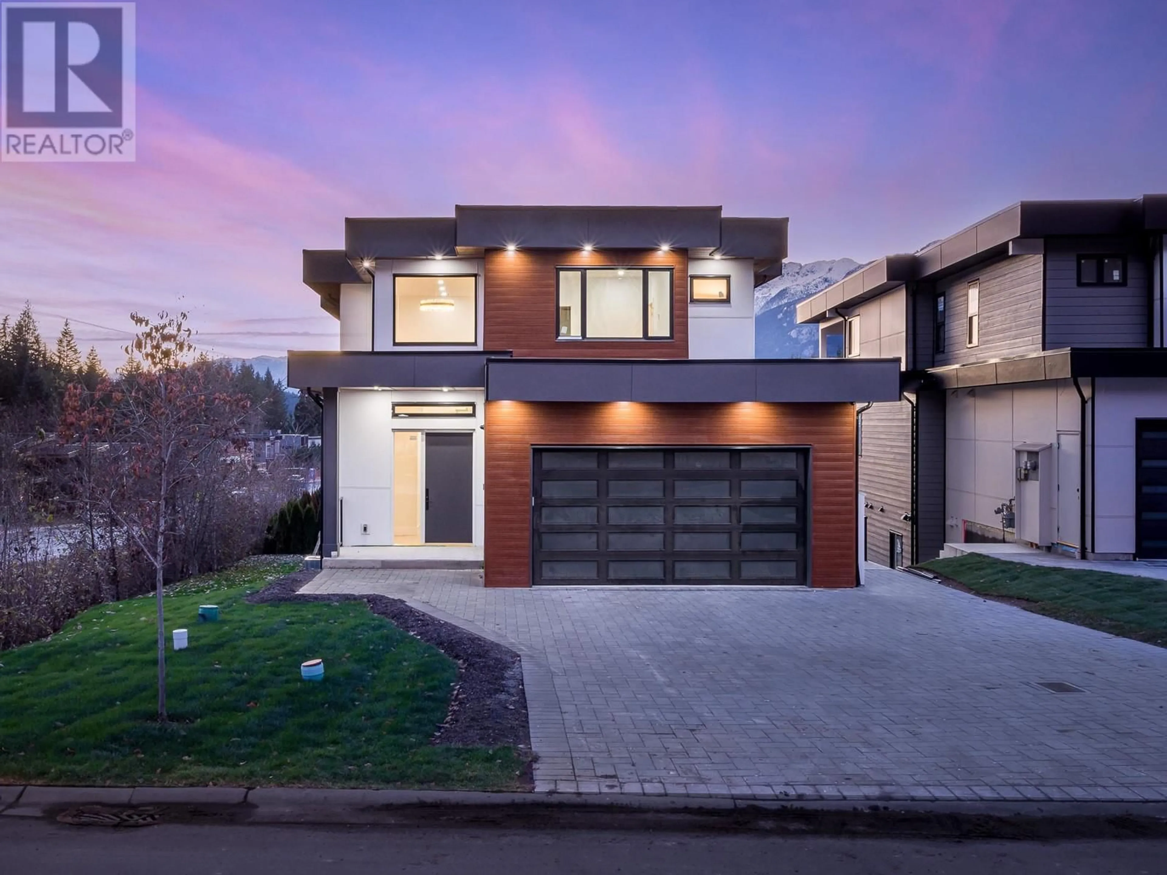 Frontside or backside of a home, the street view for 1 3385 MAMQUAM ROAD, Squamish British Columbia V8B0E3