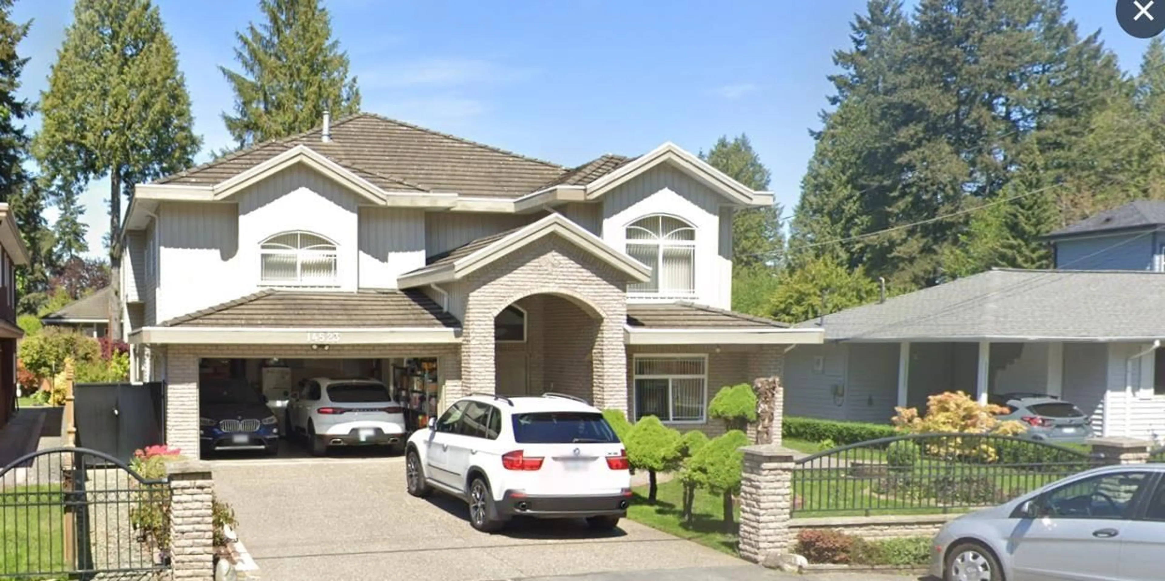 Home with vinyl exterior material, street for 14523 105A AVENUE, Surrey British Columbia V3R1S2