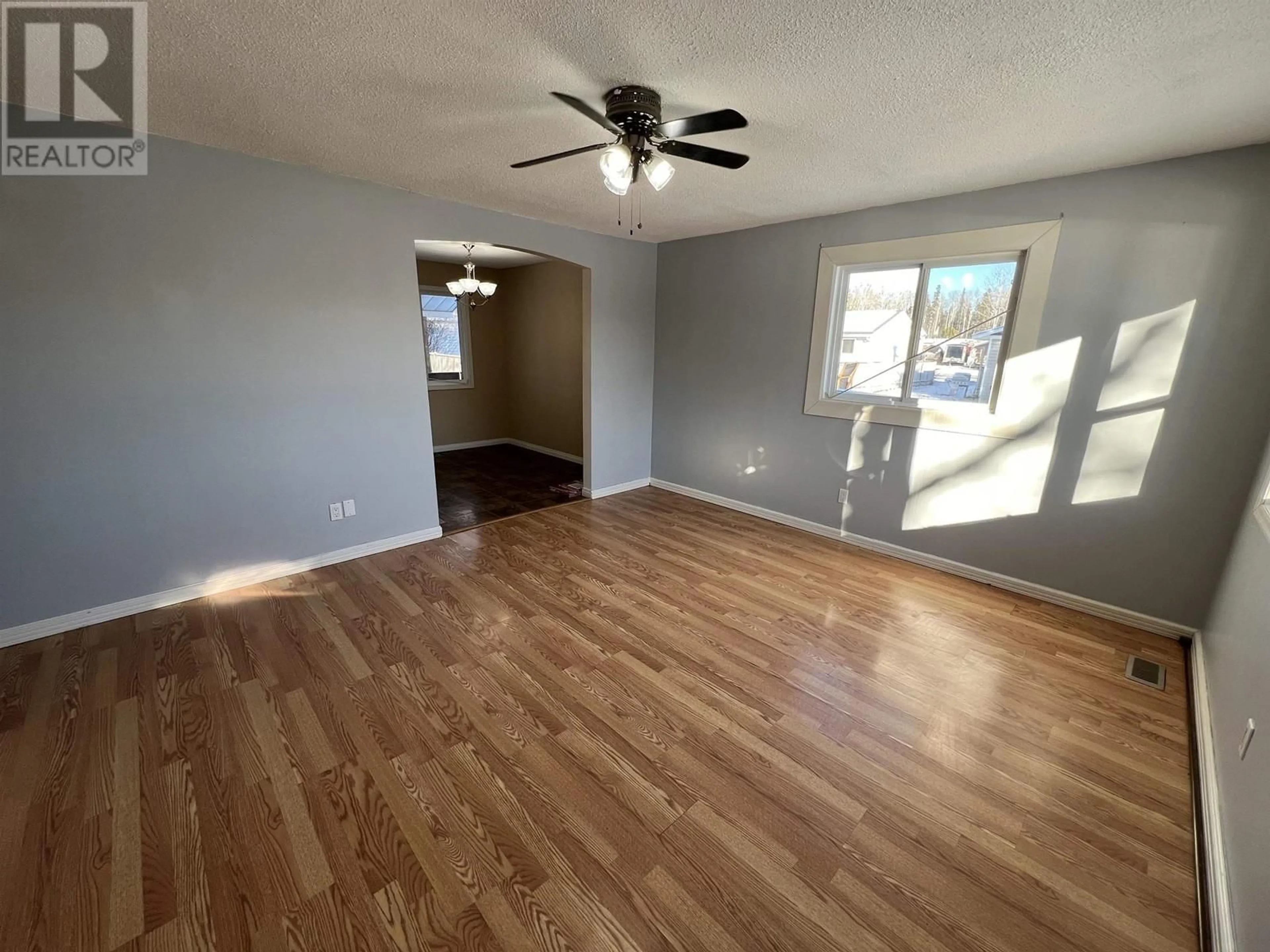 A pic of a room, wood floors for 3904 E 53 AVENUE, Fort Nelson British Columbia V0C1R0